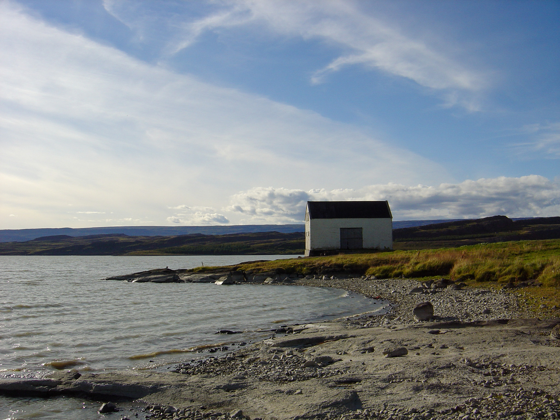 Another by the lake near Egilsstaðir. A house or shed is near the centre of the image.