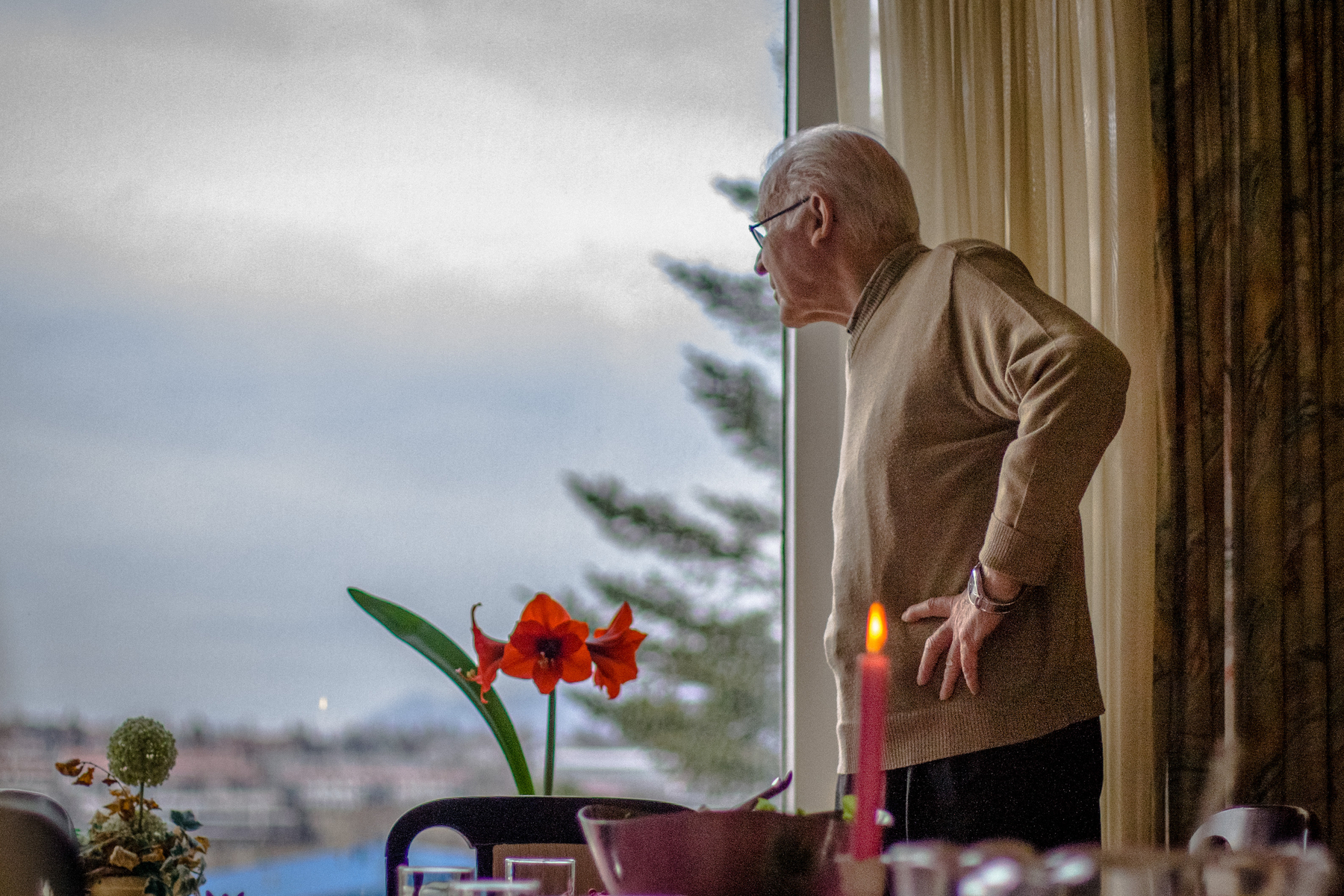 My granddad, Ingvar Magnússon, looks out of his living room window.