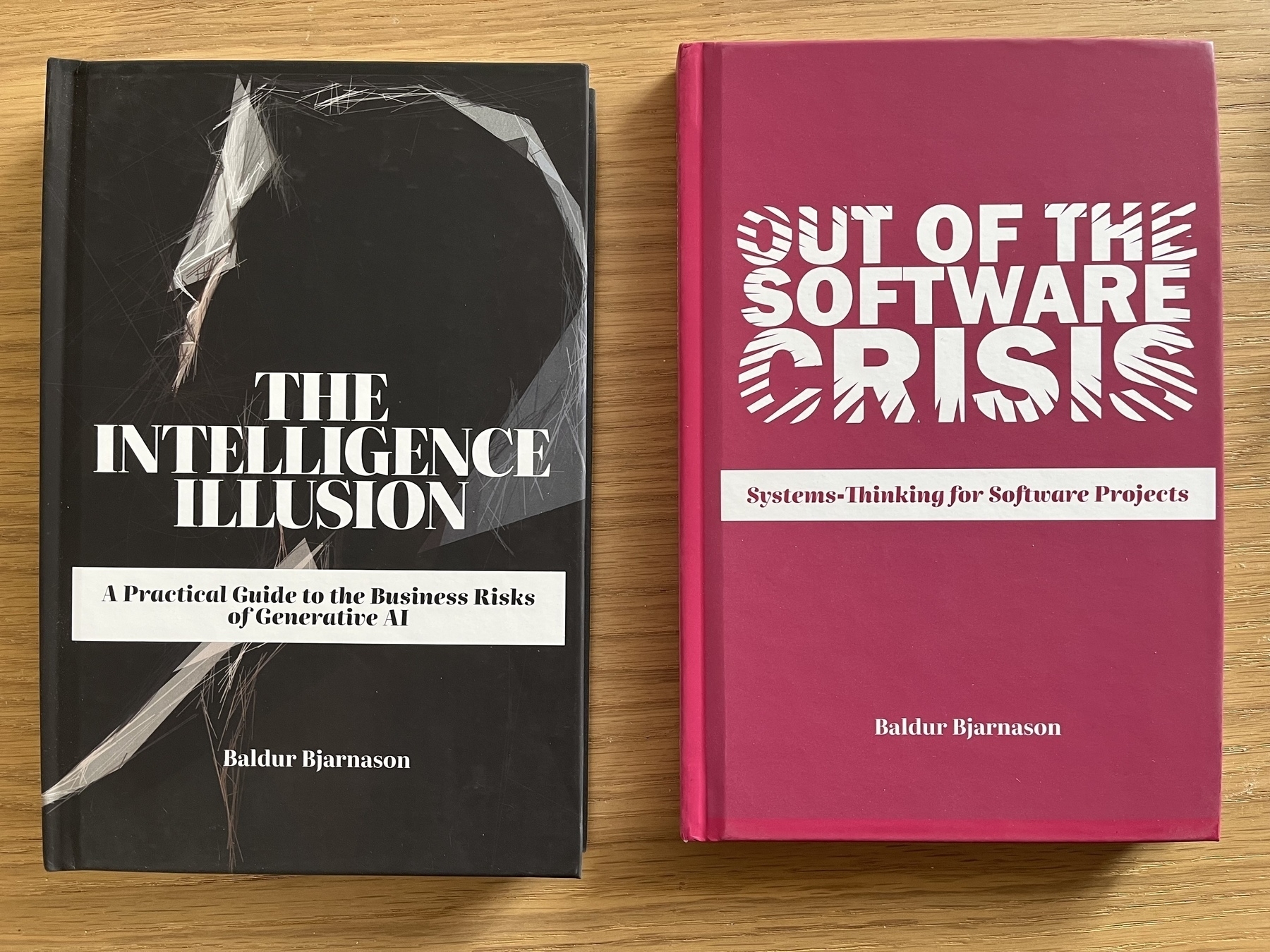 Print versions of my books: The Intelligence Illusion and Out of the Software Crisis. Side by side.