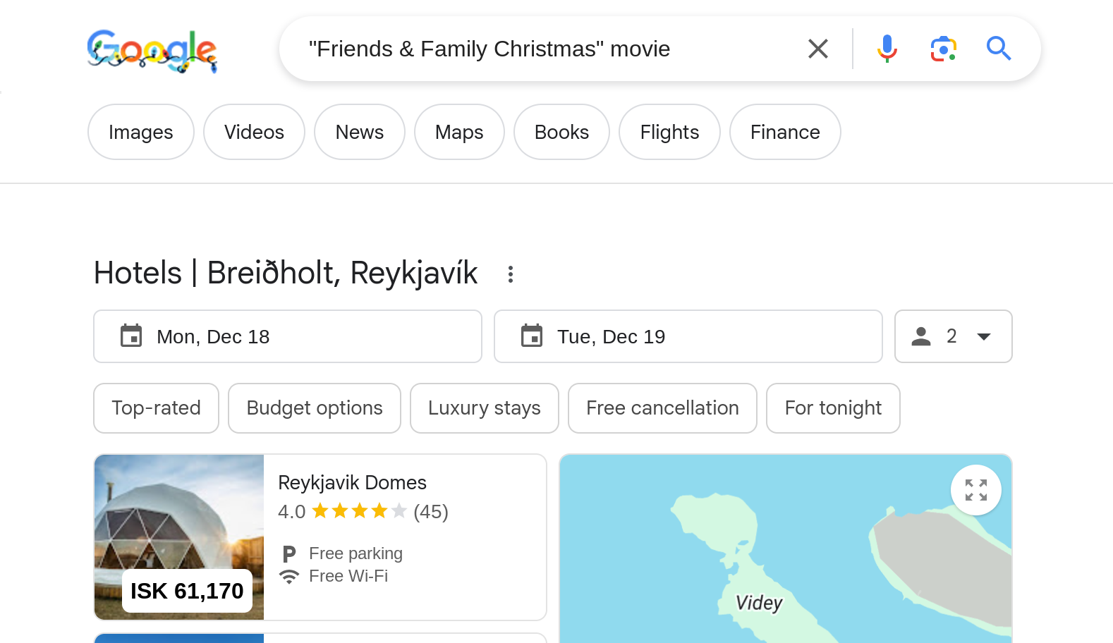 A google search result for the query '"Friends & Family Christmas" movie'. The top result is an overview of the hotels available in Breiðholt, Reykjavík.