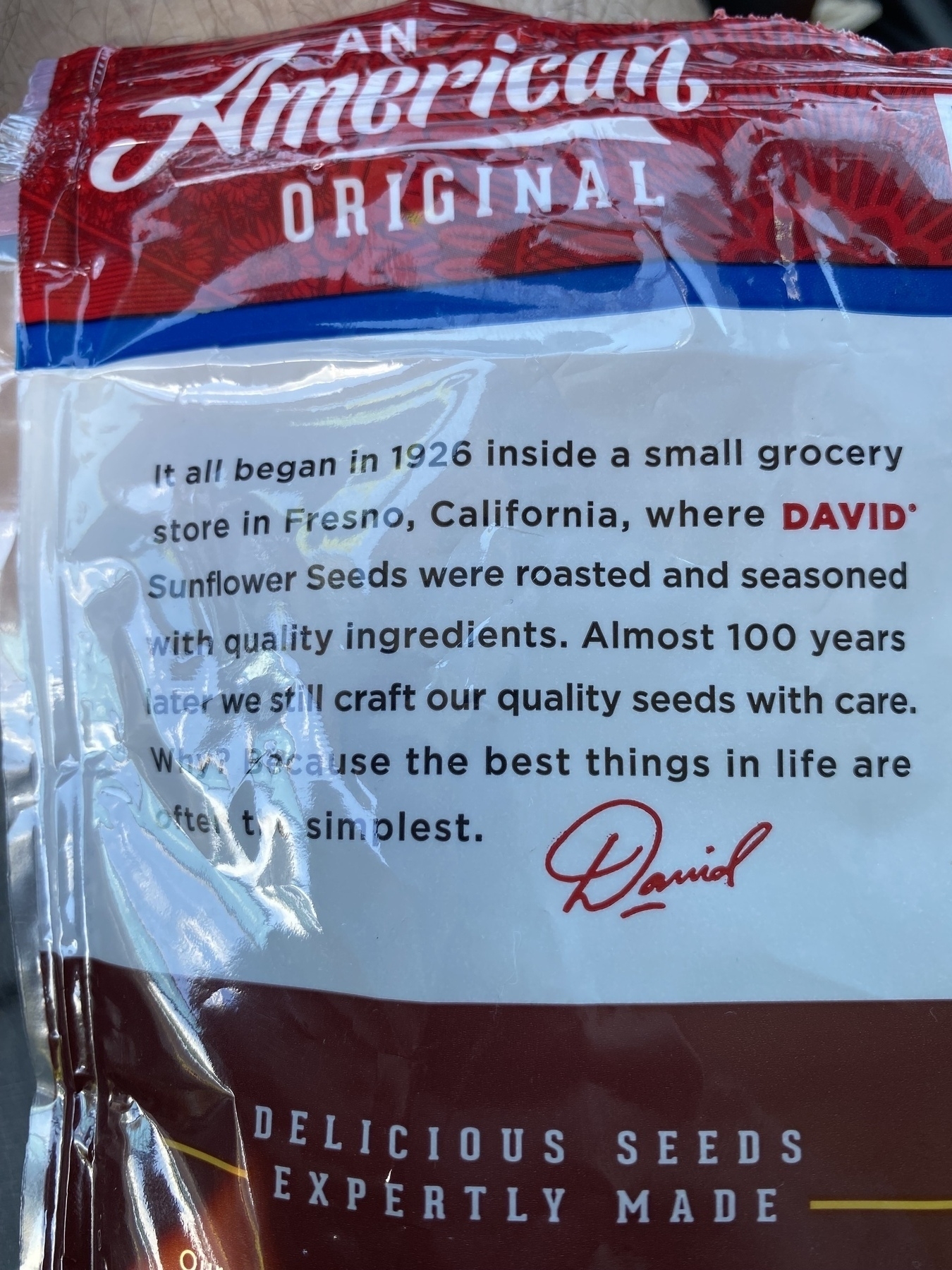 Picture of the back of a David Sunflower Seeds bag explaining they started in Fresno, California. 