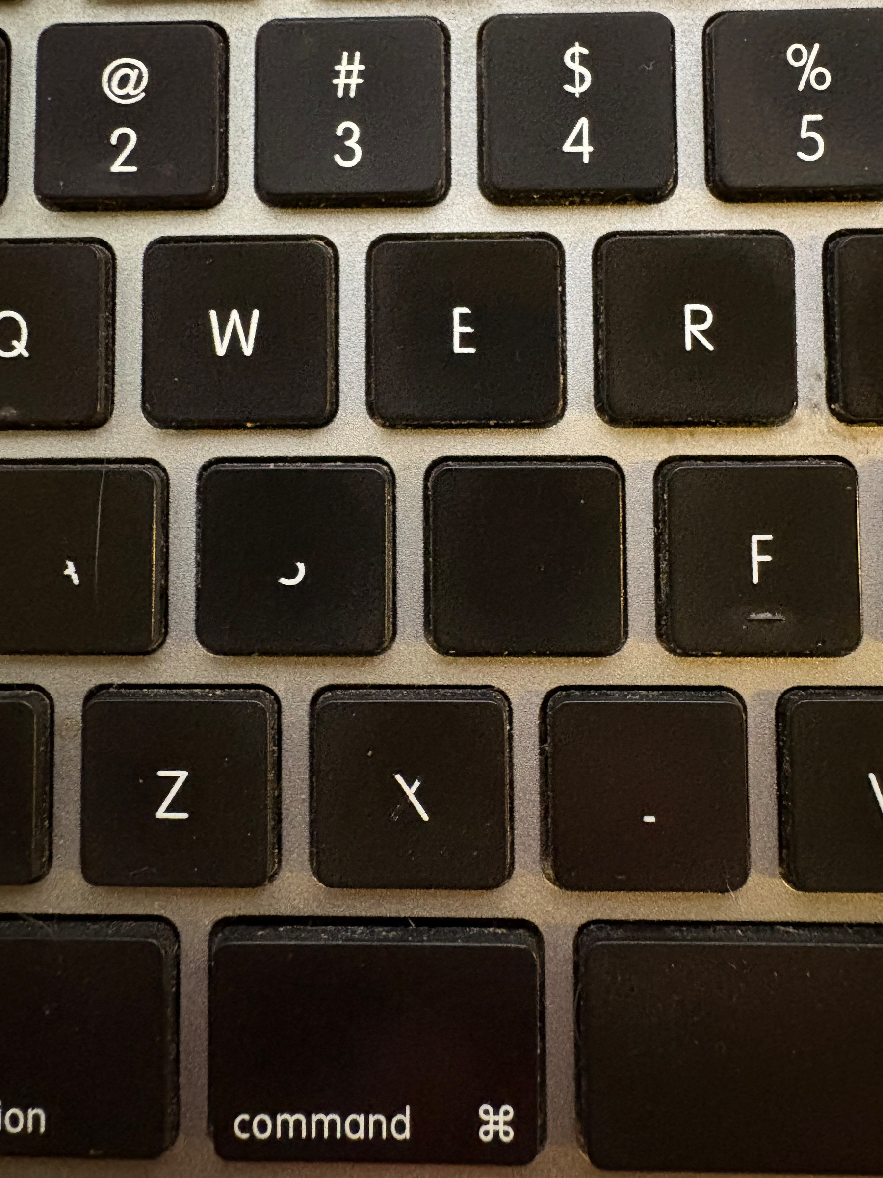 Keyboard with some keys missing part or all of their letters.