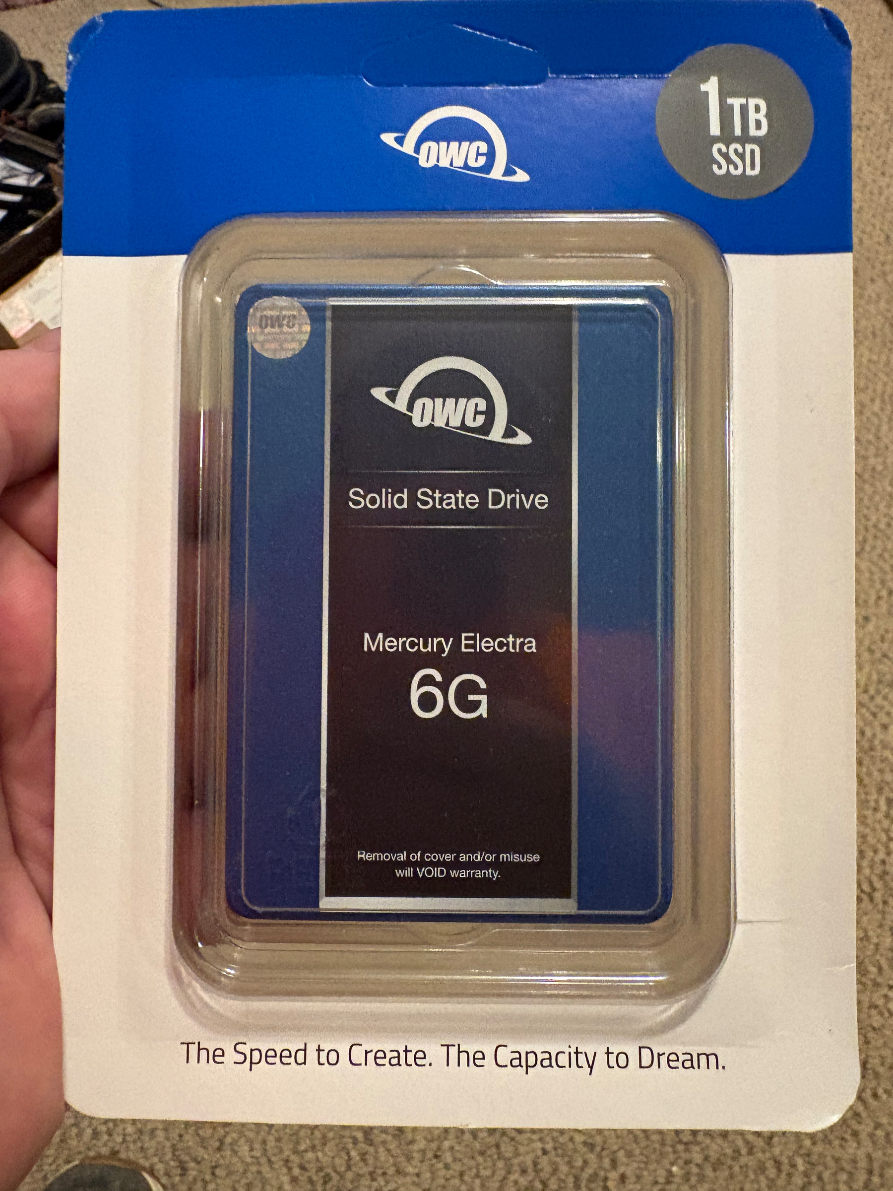 Picture of an OWC 1TB SSD still in its case.