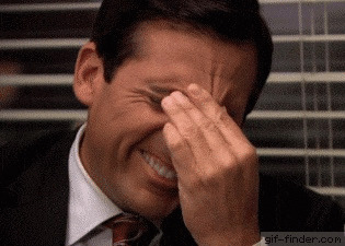 Michael Scott rubbing his eyes in frustration.