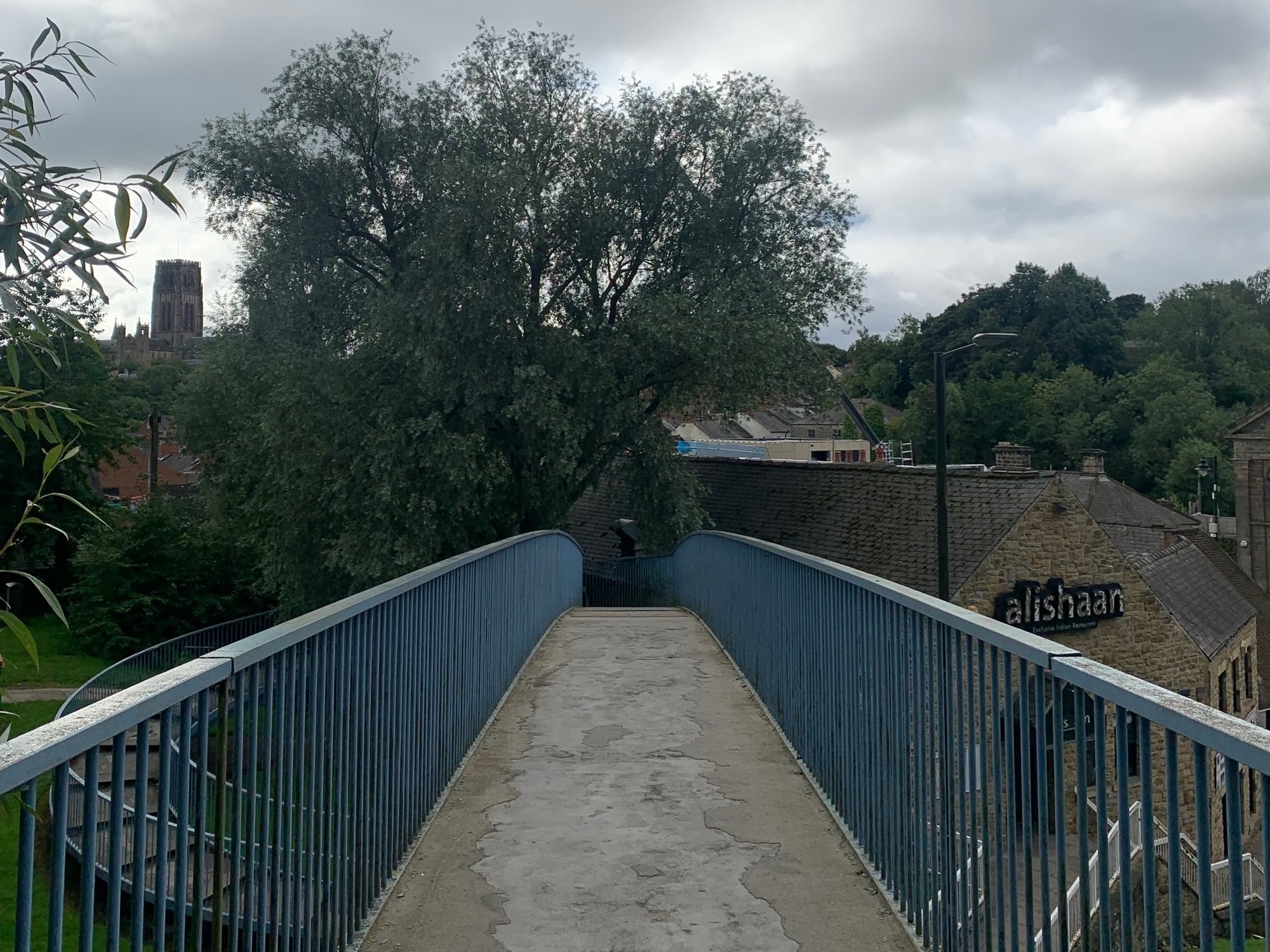 The path of a footbridge over a road.