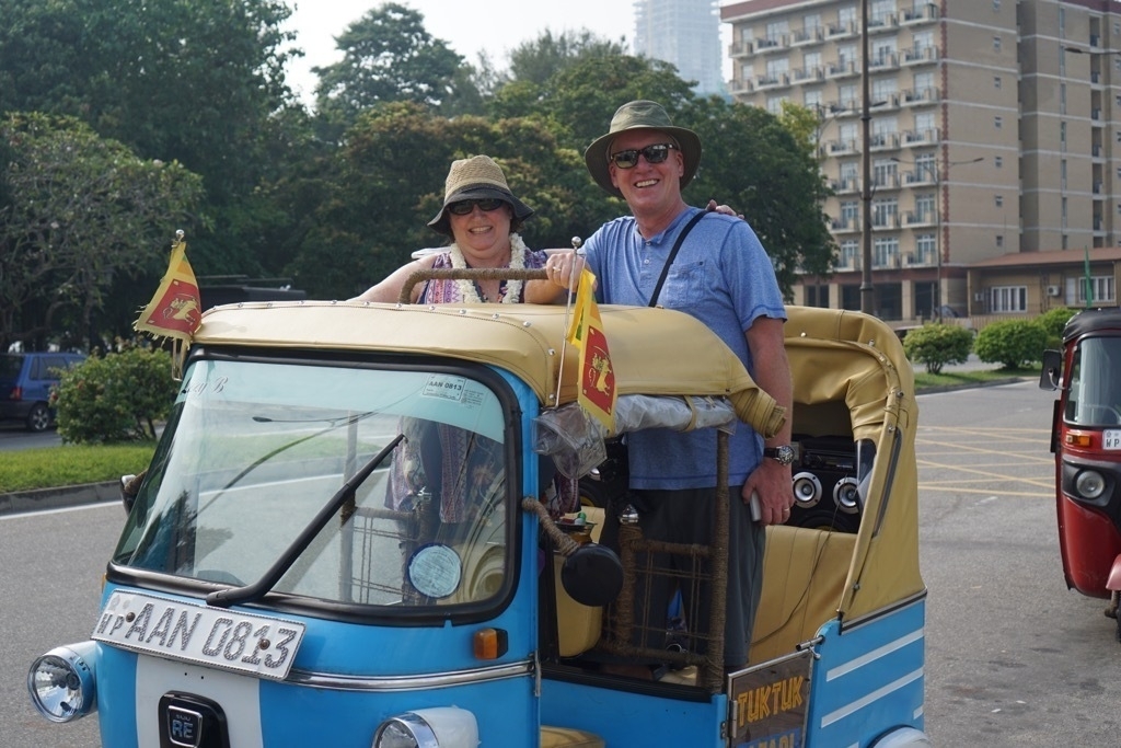 Enjoying the open air tour of Colombo aboard our tuk tuk with our
driver "Big Show".
