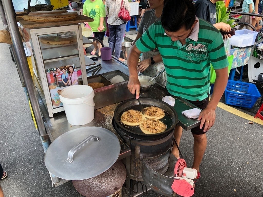 A street vendor preparing our peanut pancakes.
Delicious!