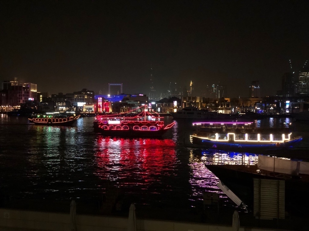 A night time view of the creek with the dinner cruise dhows. In the
background you can see the Dubai Frame as well as the Burj
Khalifa