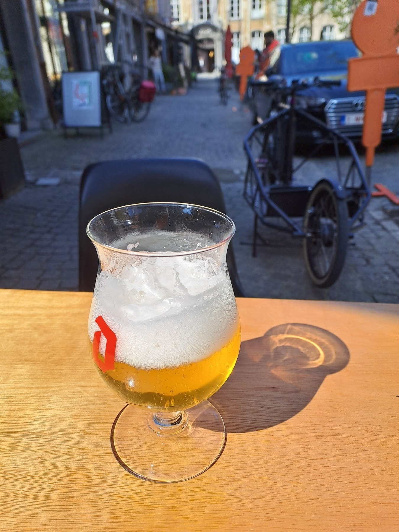 Enjoying a beer in the sun in my hometown of Antwerp