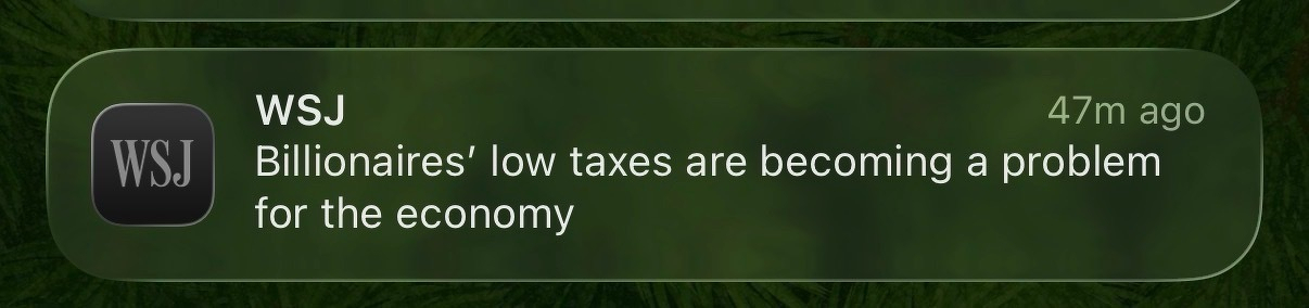 WSJ phone alert saying “Billionaires’ low taxes are becoming a problem for the economy”