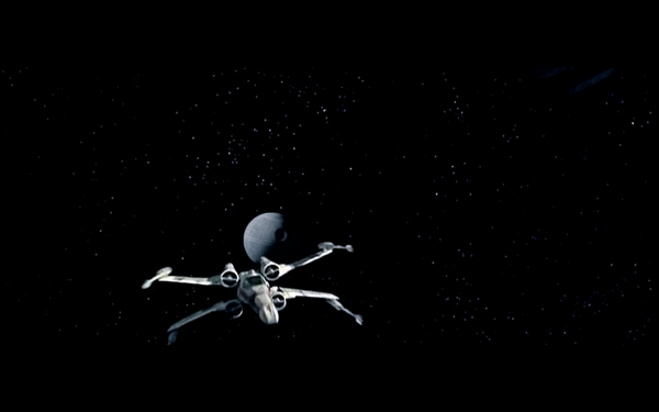 Luke's X wing flying away from Death Star