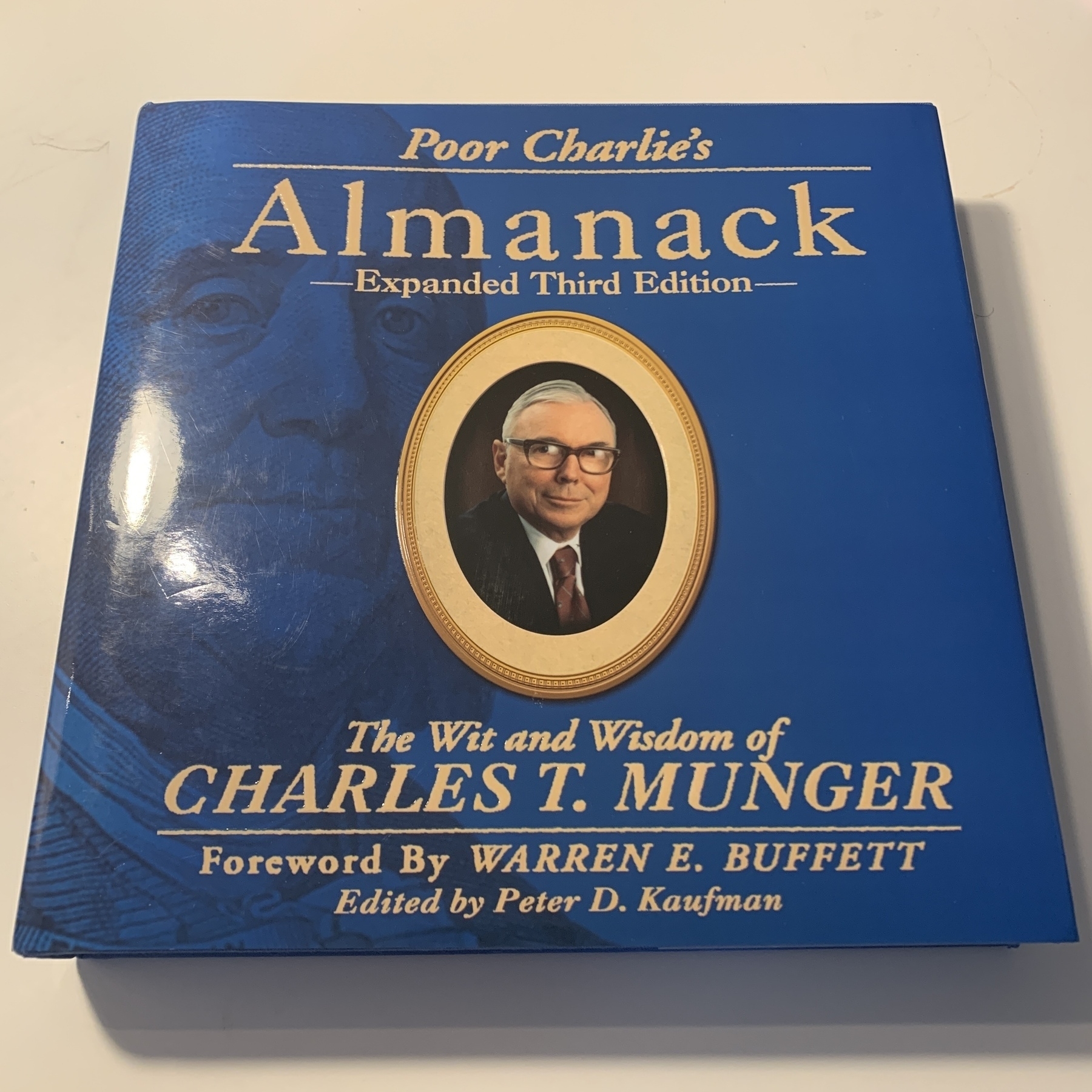 A picture of the book “Poor Charlie’s Almanack” expanded third edition.