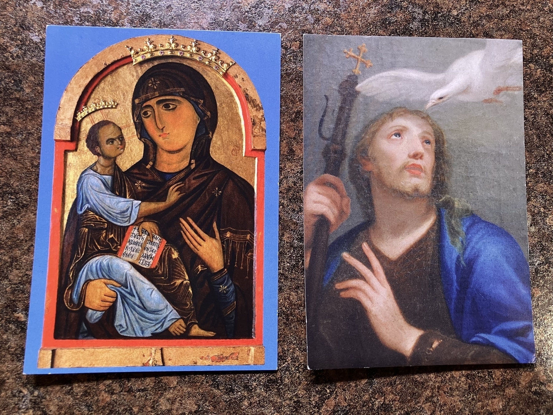 Auto-generated description: The image shows two religious artworks: one depicts the Virgin Mary holding baby Jesus, both crowned, and the other features a saint-like figure with a dove near their head.