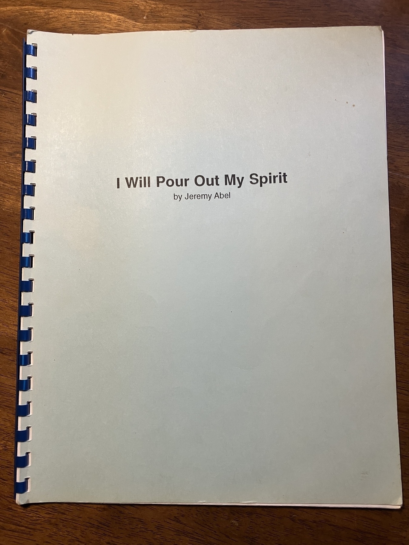 Auto-generated description: A spiral-bound document is titled I Will Pour Out My Spirit by Jeremy Abel.