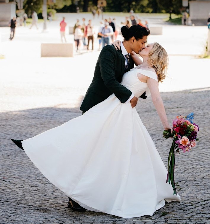 Bride and Groom in Brooklyn sharing a 'swoony' kiss