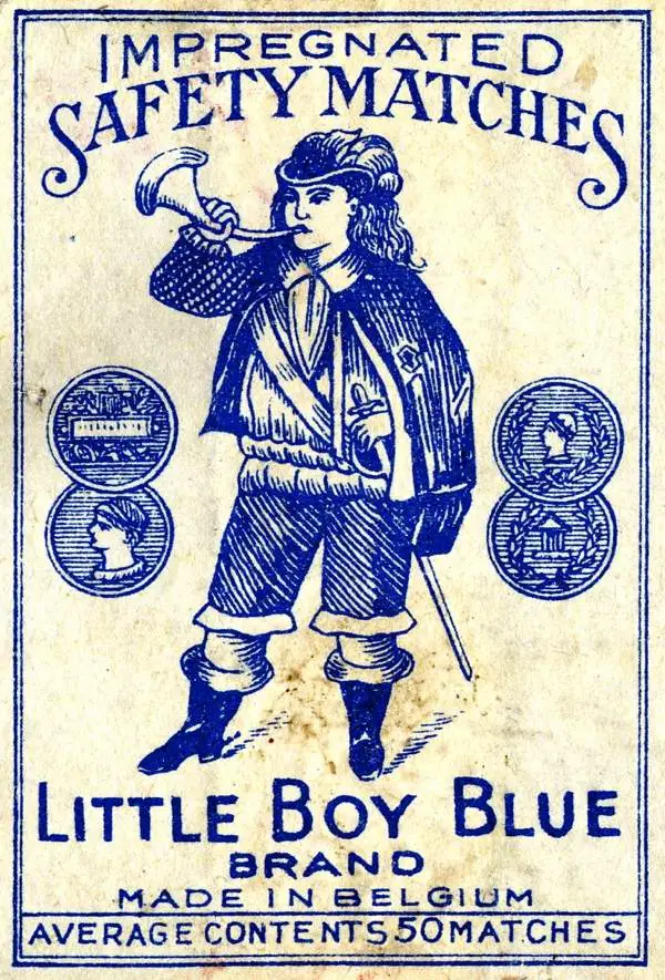 A matchbox cover showing 18C boy in blue blowing a horn