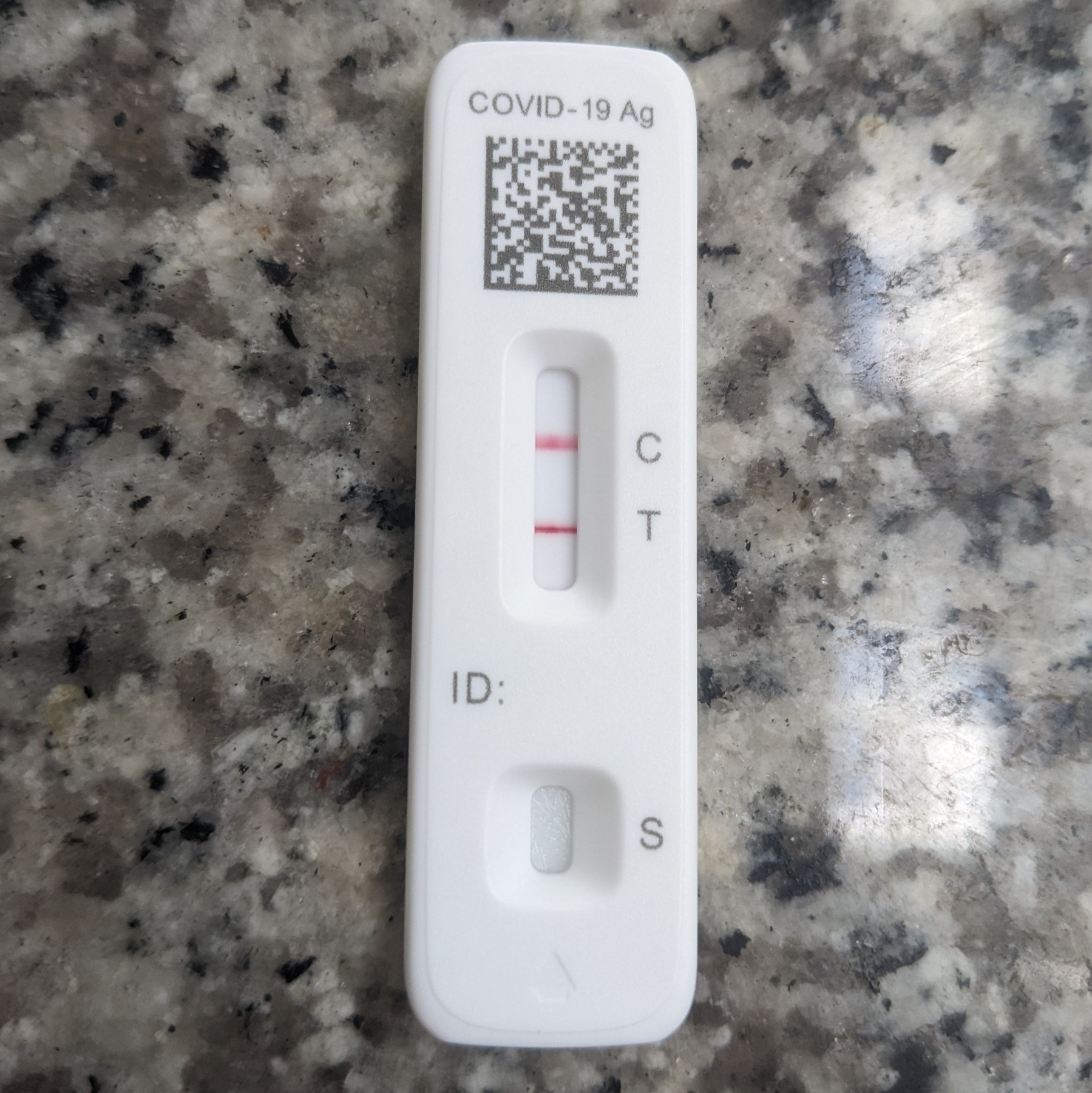 A photo of a positive COVID test