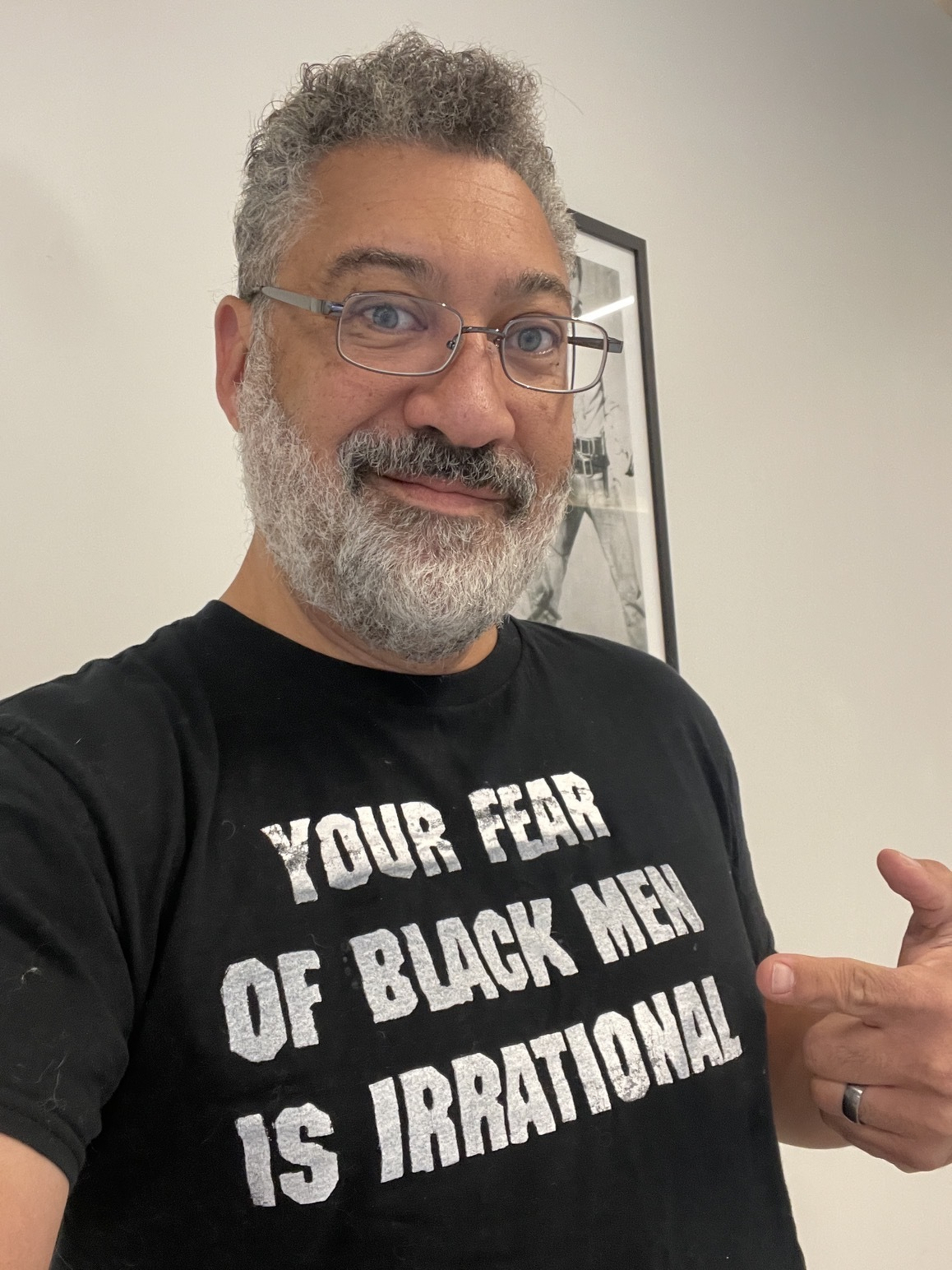 Me in a shirt that reads "Your fear of Black men is irrational"