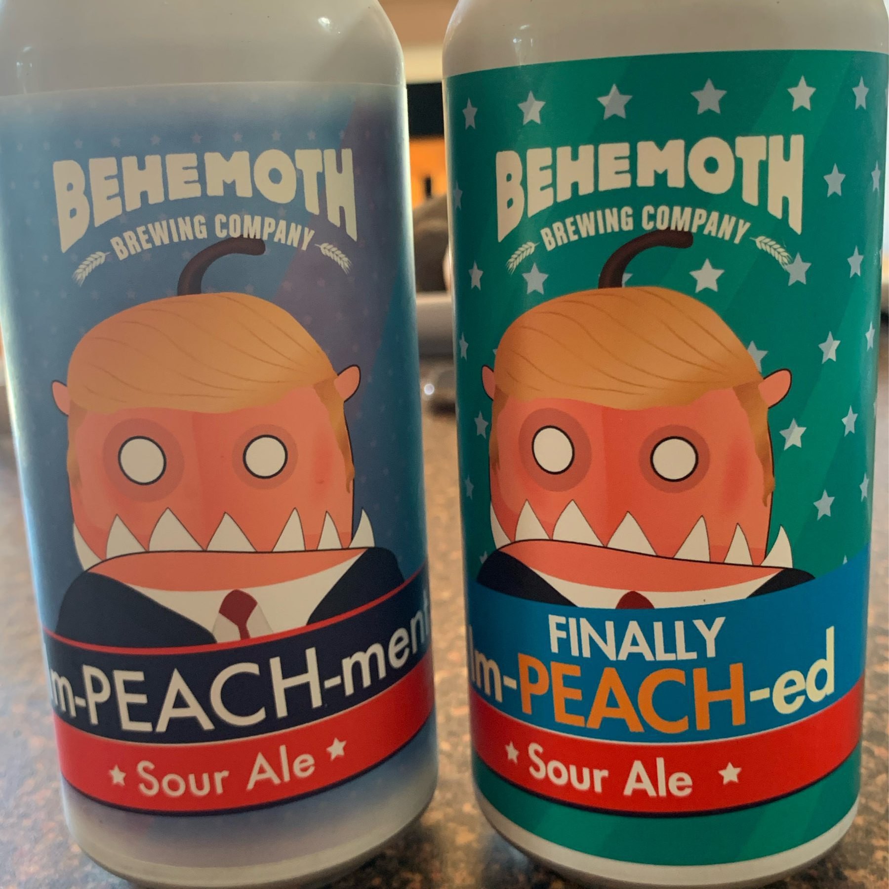 Cans of Im-peach-ment and Finally Im-peach-ed sour ales by Behemoth brewing. 