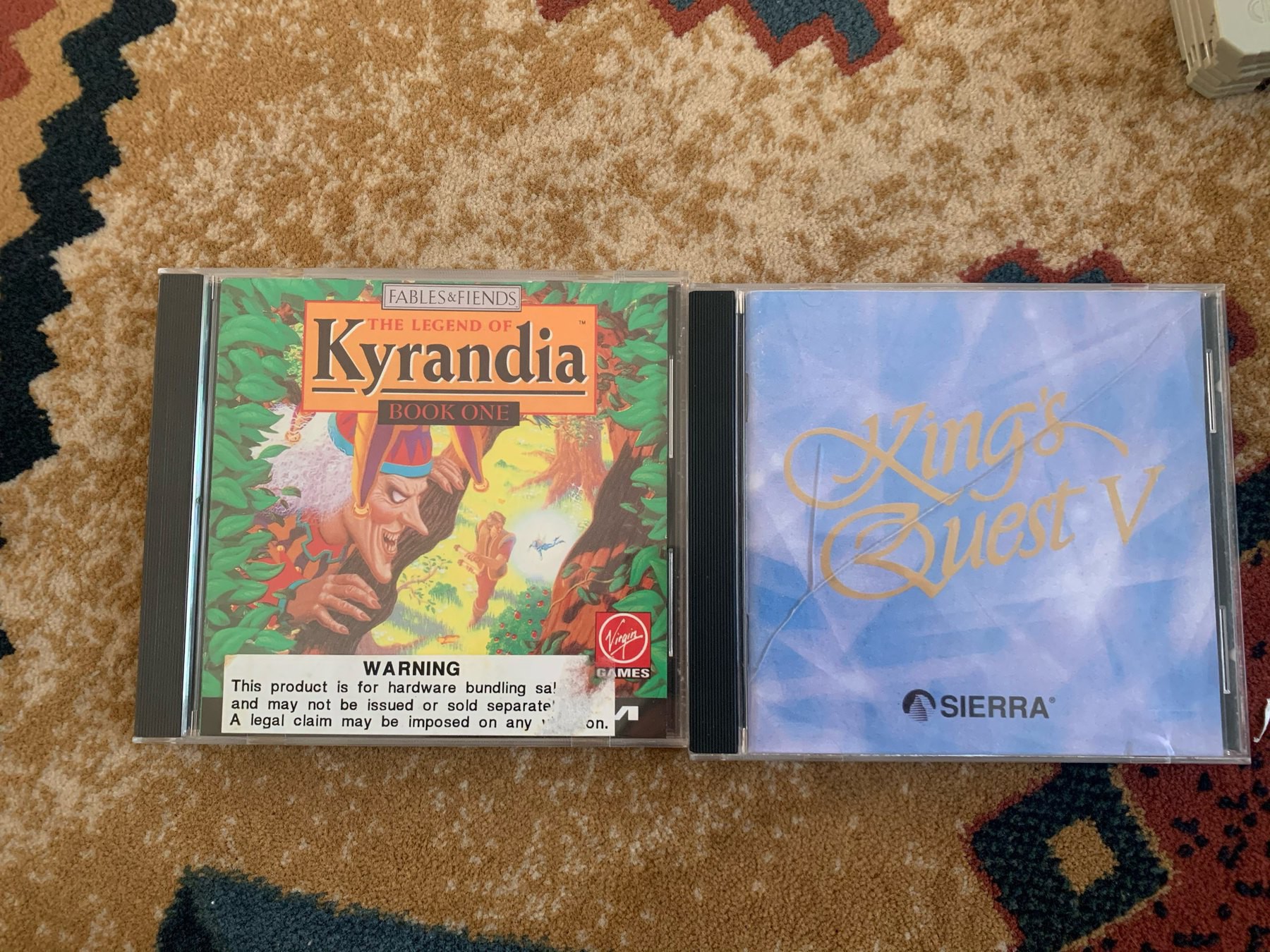 CDs for the games Legend of Kyrandia and Kings Quest V