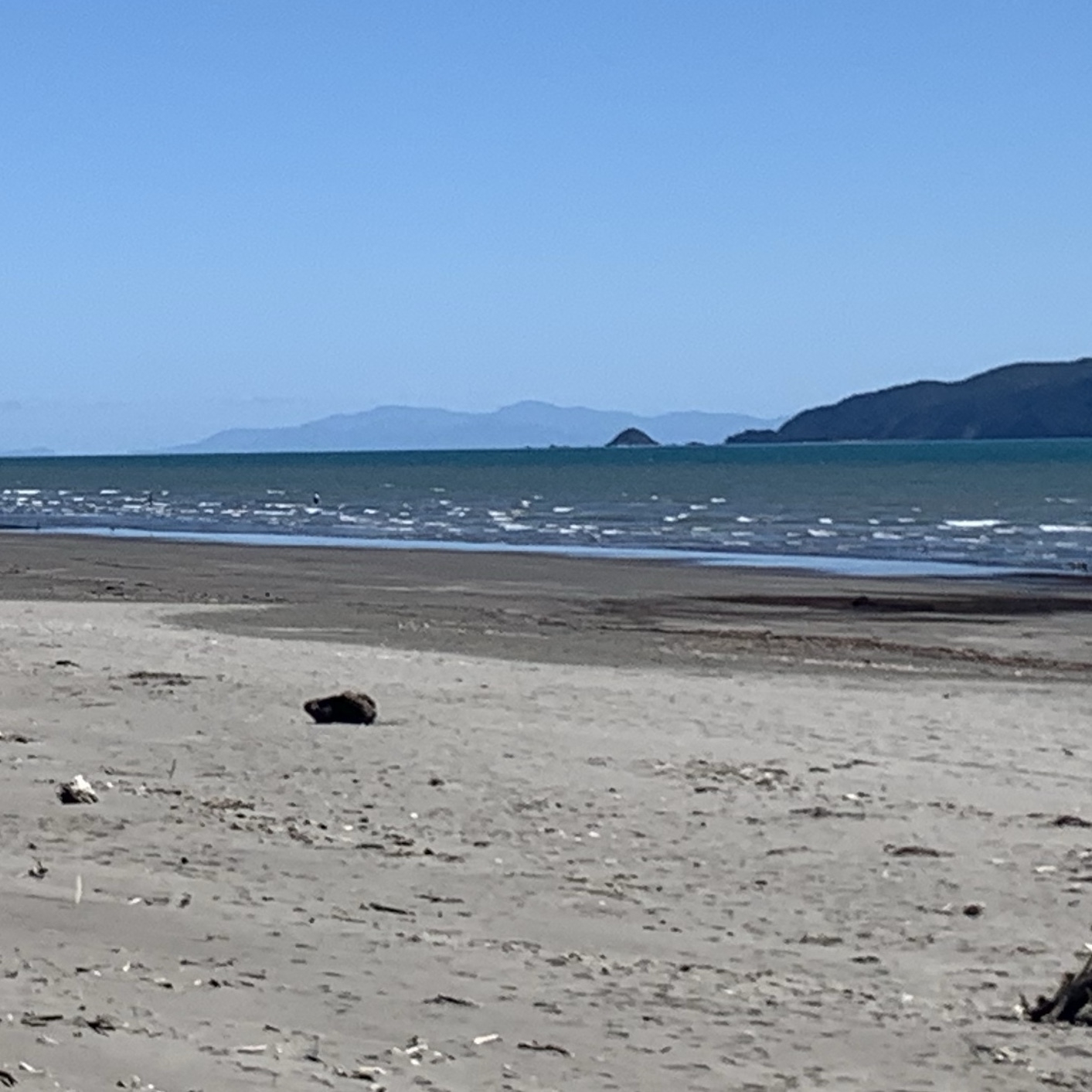 The South Island in the far diatance as taken from the beach at Waikanae