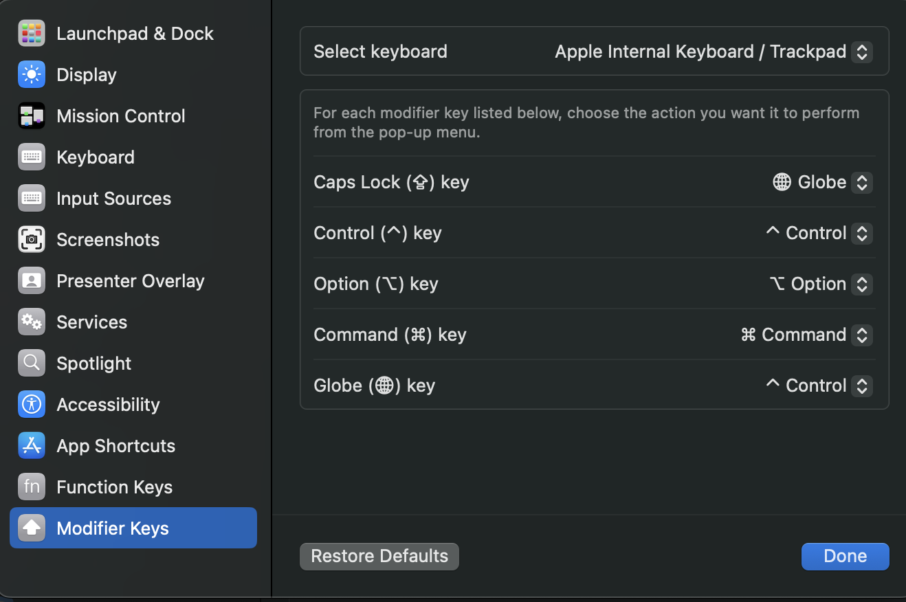 The setting dialog on Mac 15.1 in Settings→Keyboard→Keyboard Shortcuts. The Modifier Keys section is selected showing which keys are maped to what on my Mac. Here, Caps lock is mapped to Globe