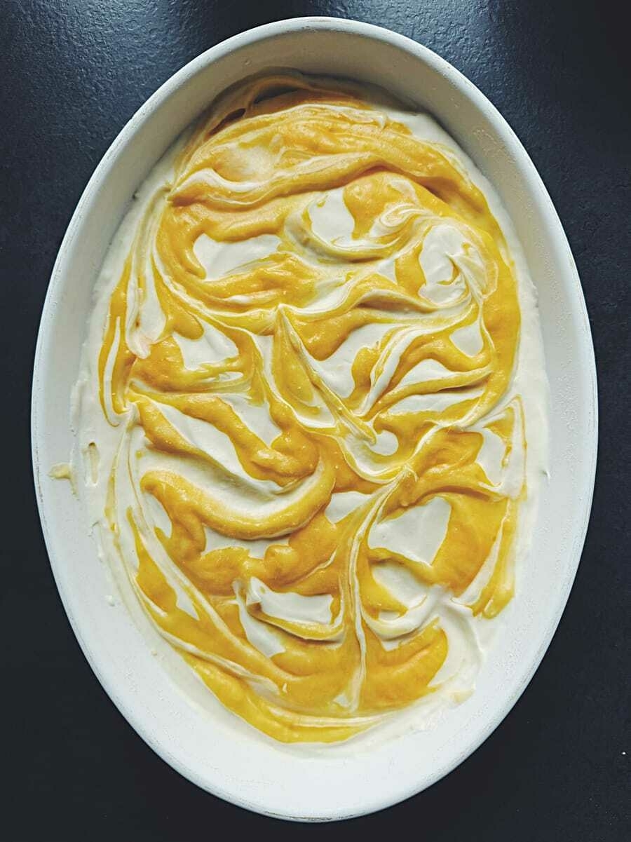 Marbled ice cream with swirls of lemon curd. It looks delicious, though it has a slightly made-by-a-child appearance.
