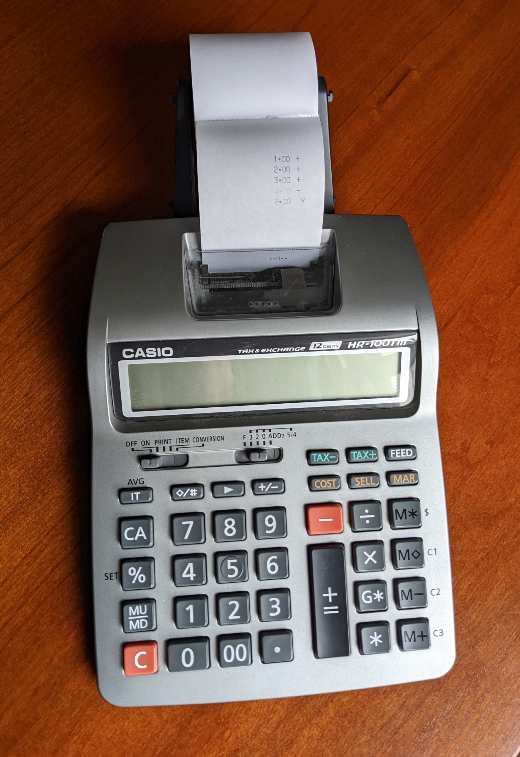 adding machine with the equation described above, printed on the tape