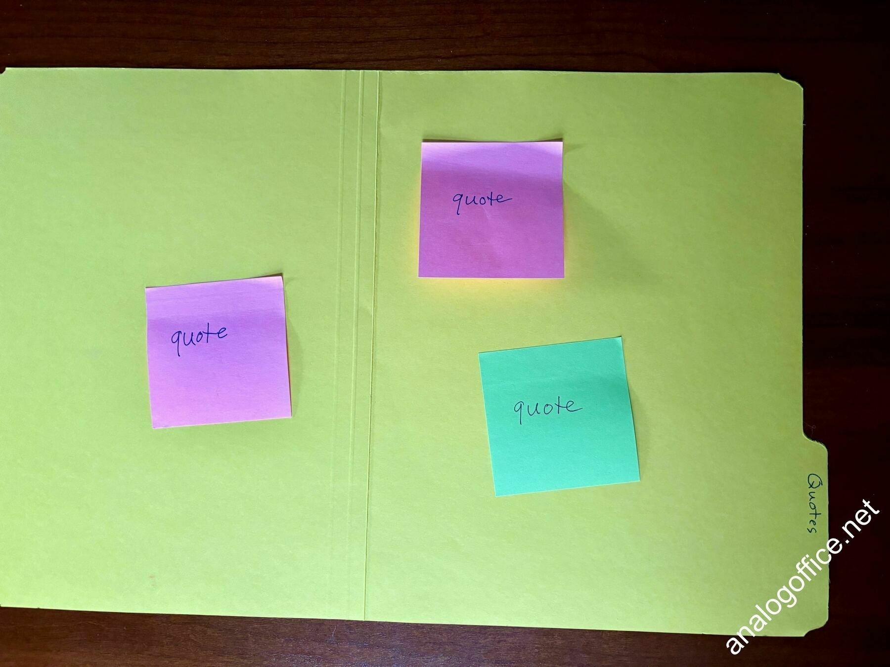 post-it notes in a folder labeled 'quotes'
