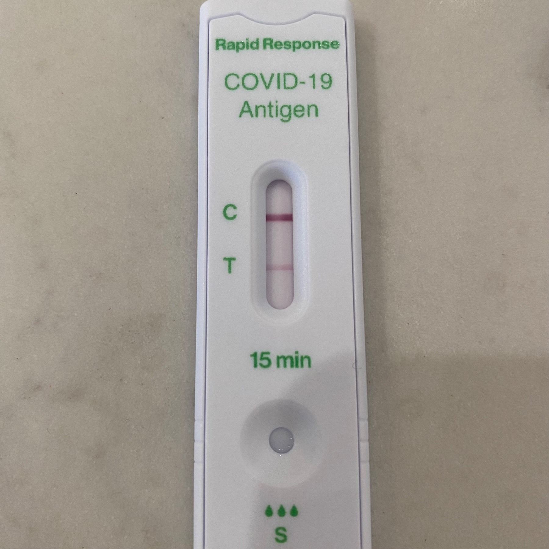COVID rapid test showing a positive result