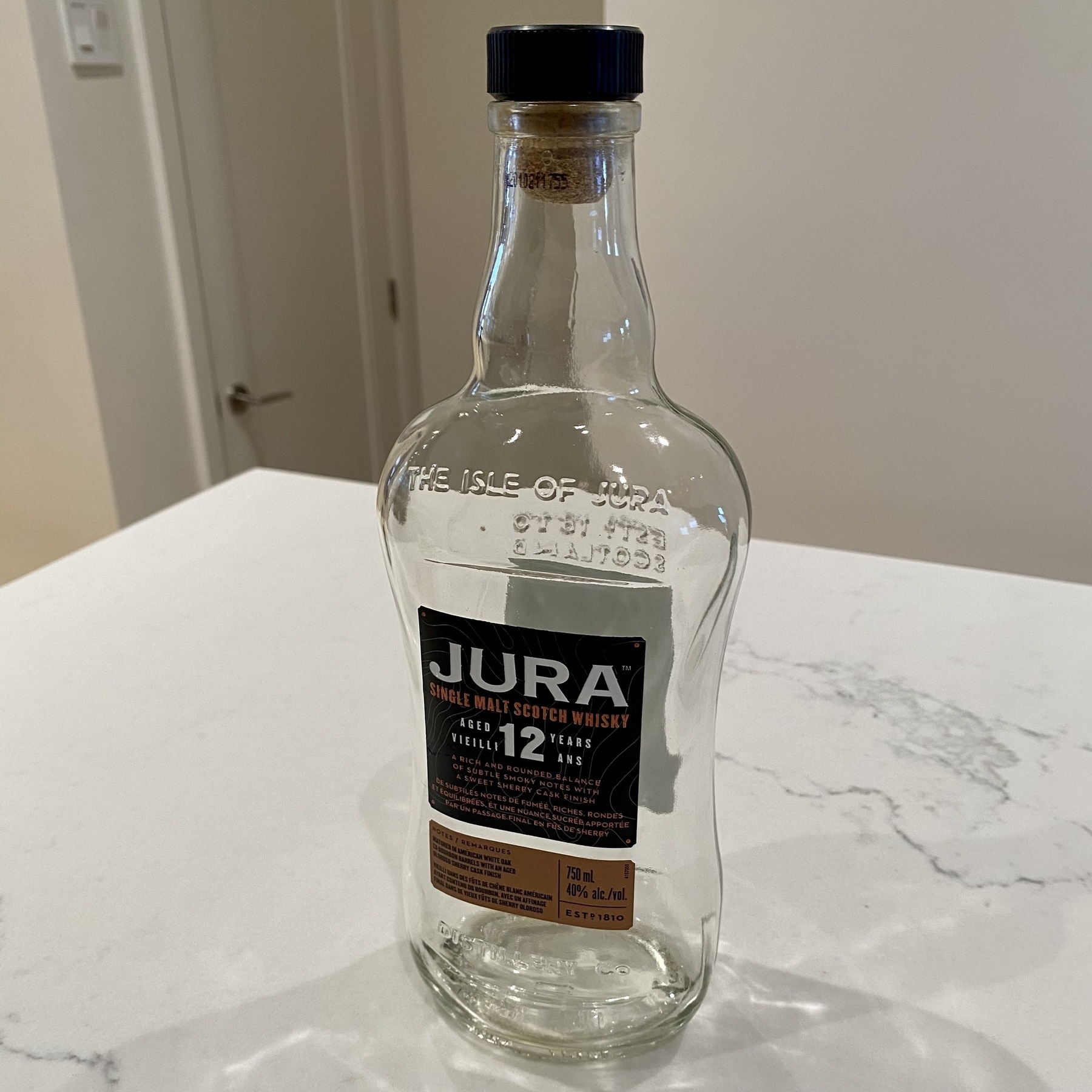 Empty bottle of Jura 12 year old whiskey 
