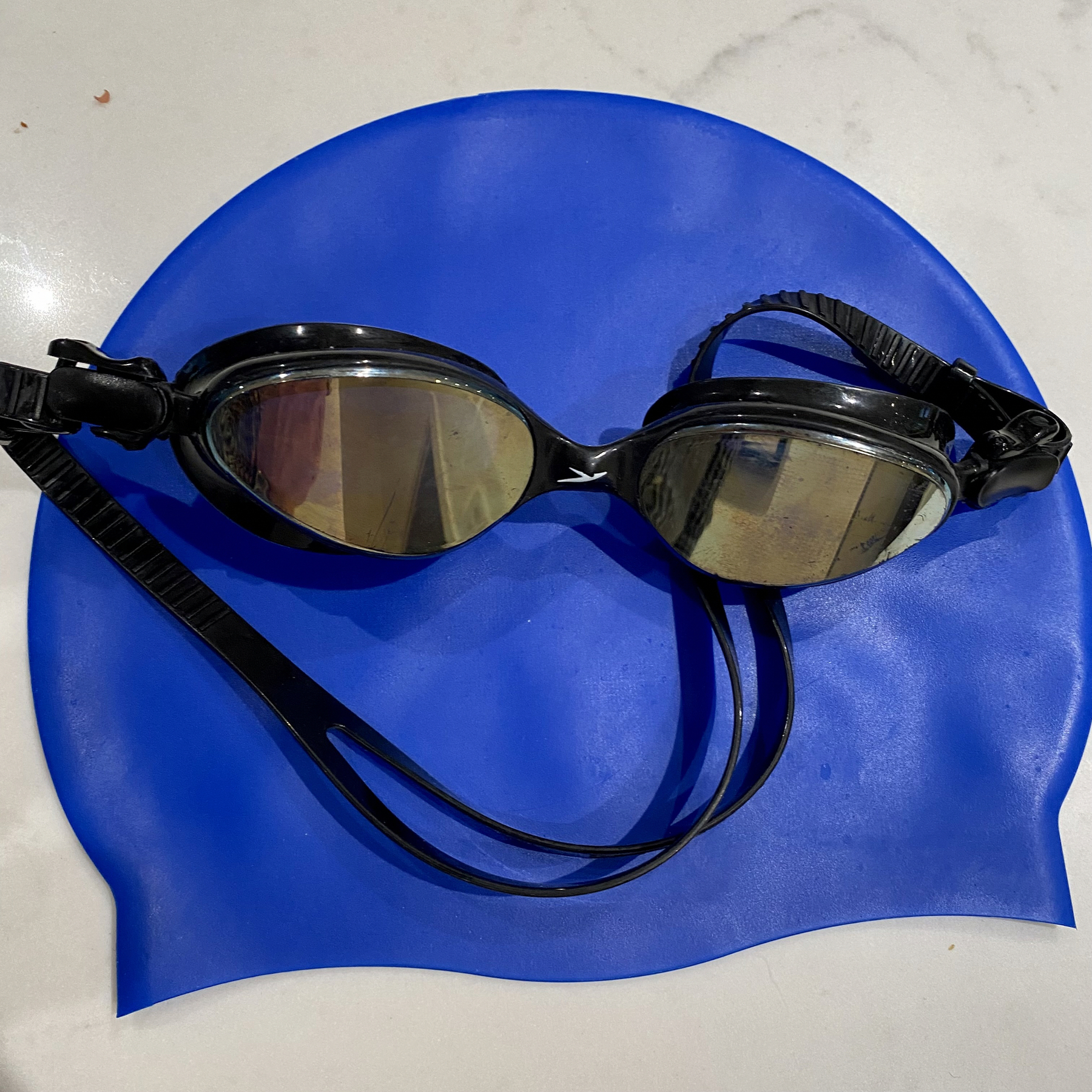 Swim goggles and cap
