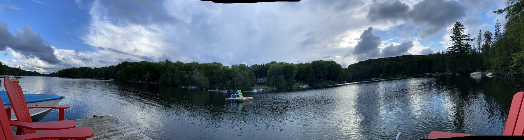 Panoramic photo of a lake from the dock