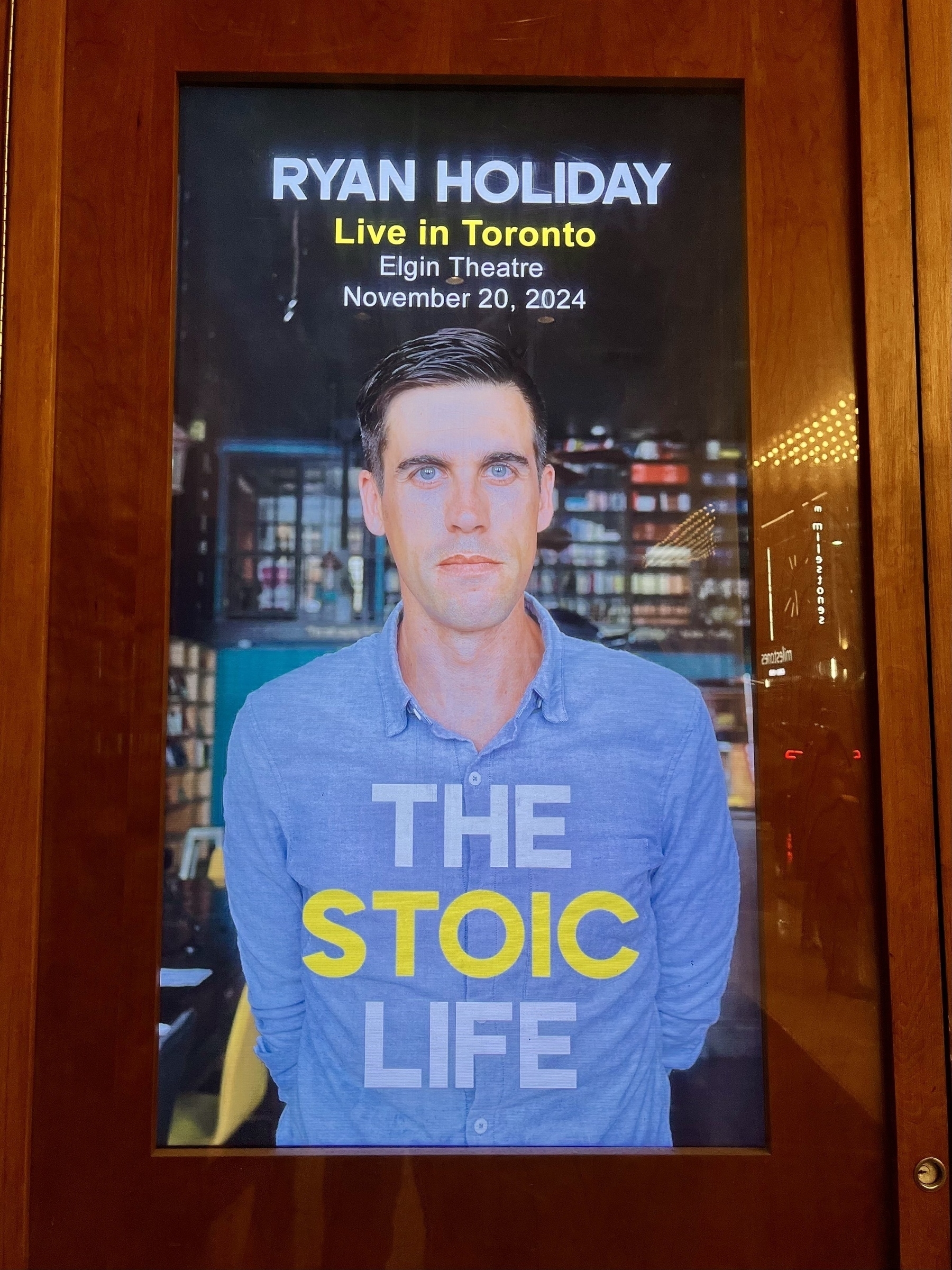 A promotional poster for "Ryan Holiday: Live in Toronto - The Stoic Life" event on November 20, 2024, at Elgin Theatre.