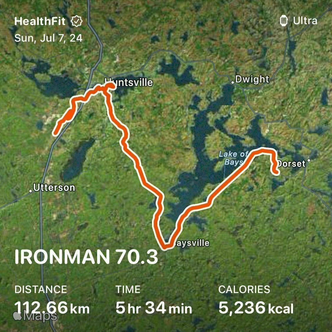 Auto-generated description: A map displays a triathlon route in the Huntsville area with details on distance (112.66 km), time (5 hours 34 minutes), and calories burned (5,236 kcal).