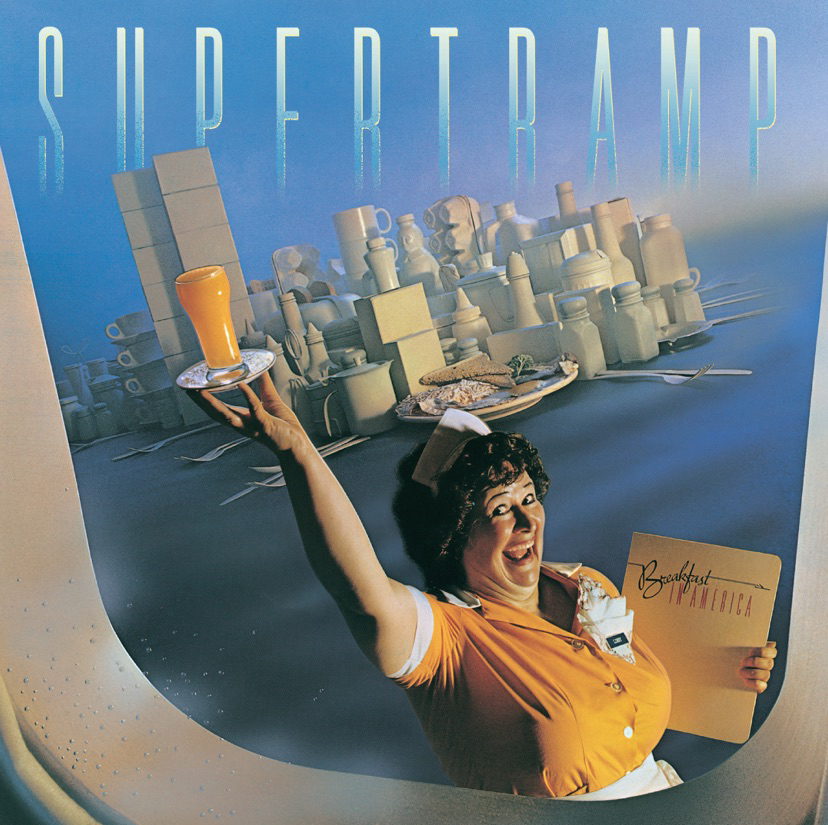 Auto-generated description: A waitress joyfully holds a serving tray with breakfast items against a backdrop of city buildings, with Supertramp prominently displayed above.