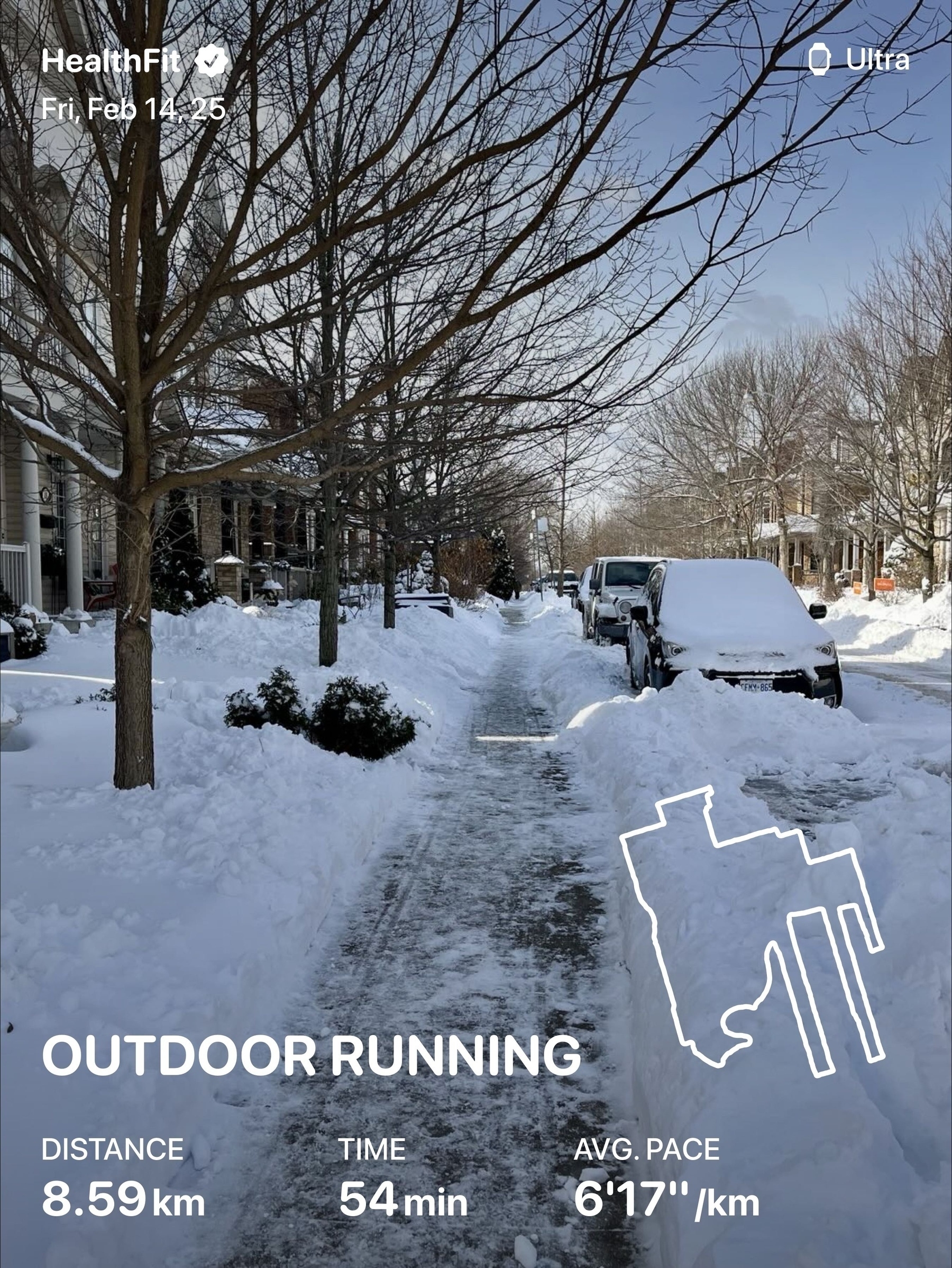 A snowy residential street is shown with a cleared pathway, lined with snow-covered cars and bare trees, accompanied by running data overlaid on the image.