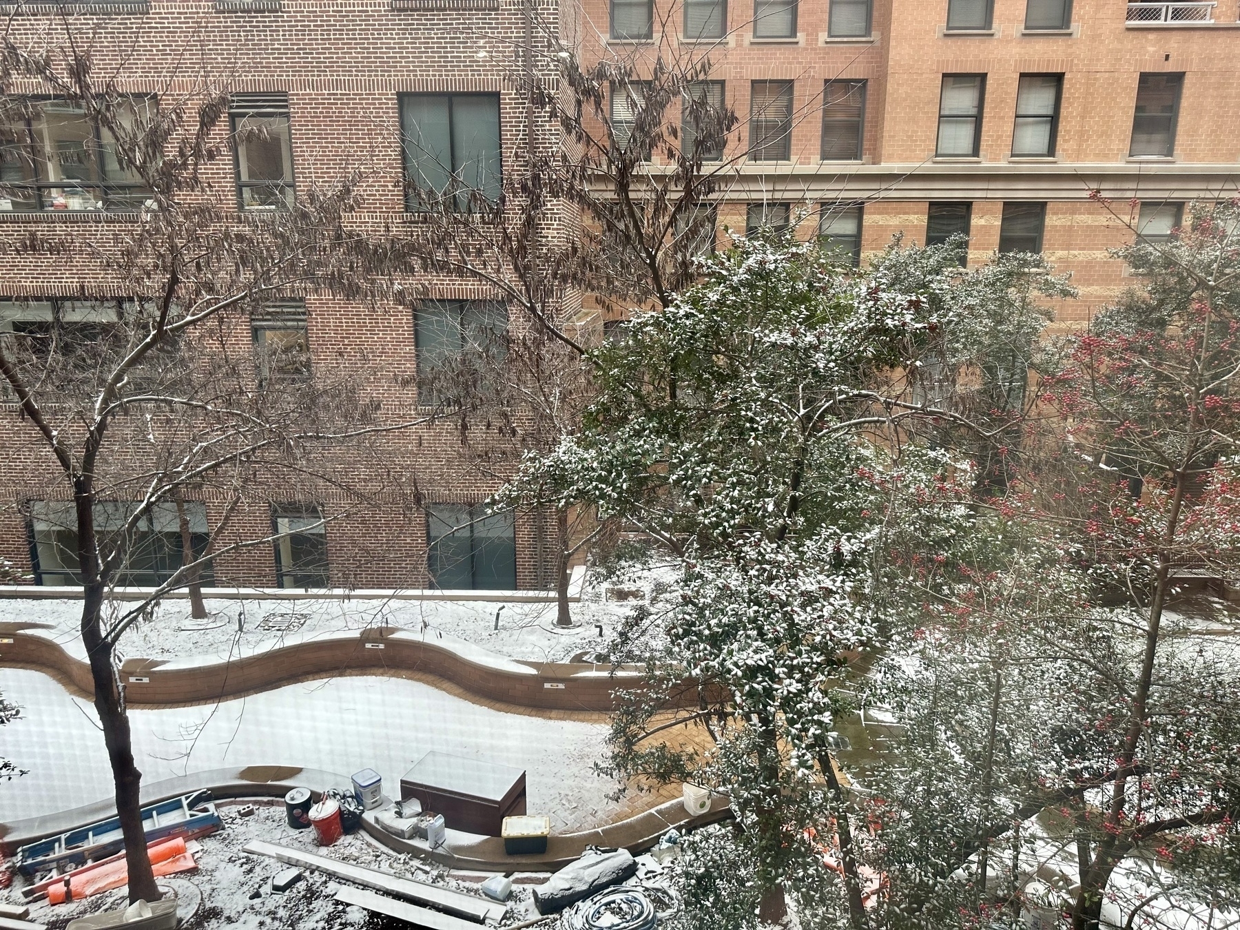 Photo of a courtyard covered by a dusting of snow.