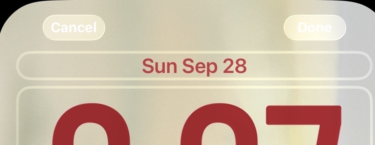 A digital interface displays a lock screen customization view with the options to Cancel or Done. “Done” is barely visible because of low contrast.