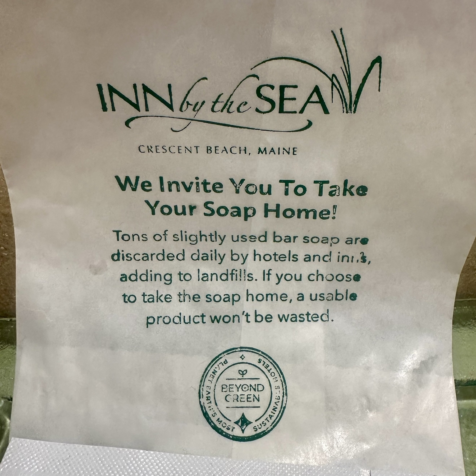 A sign from Inn by the Sea in Maine encourages guests to take slightly used bar soap home to reduce waste.