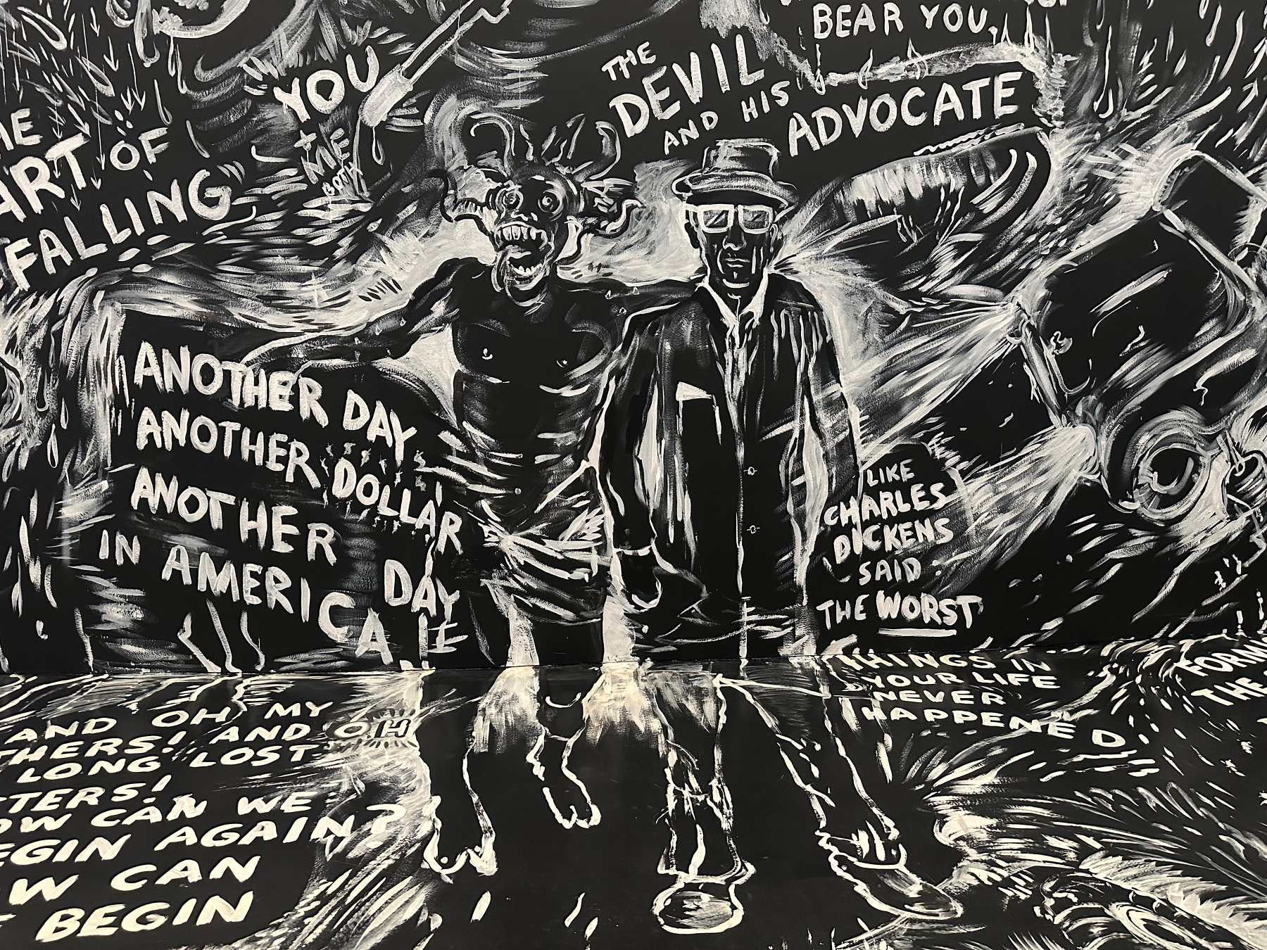 A monochrome illustration depicts a devilish figure with horns alongside a man in a hat and sunglasses, surrounded by expressive, handwritten phrases.