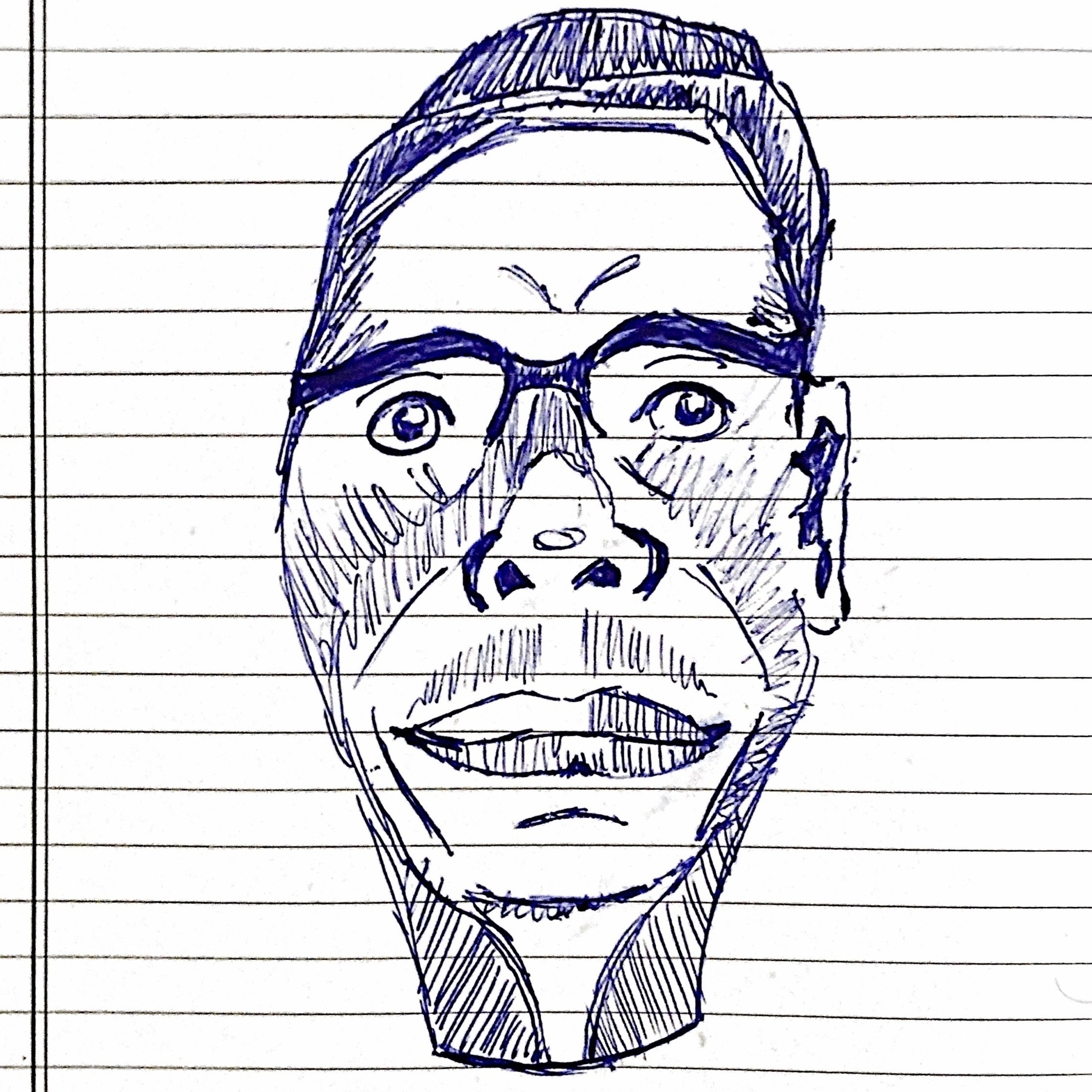 ballpoint sketch of caricature of author’s face