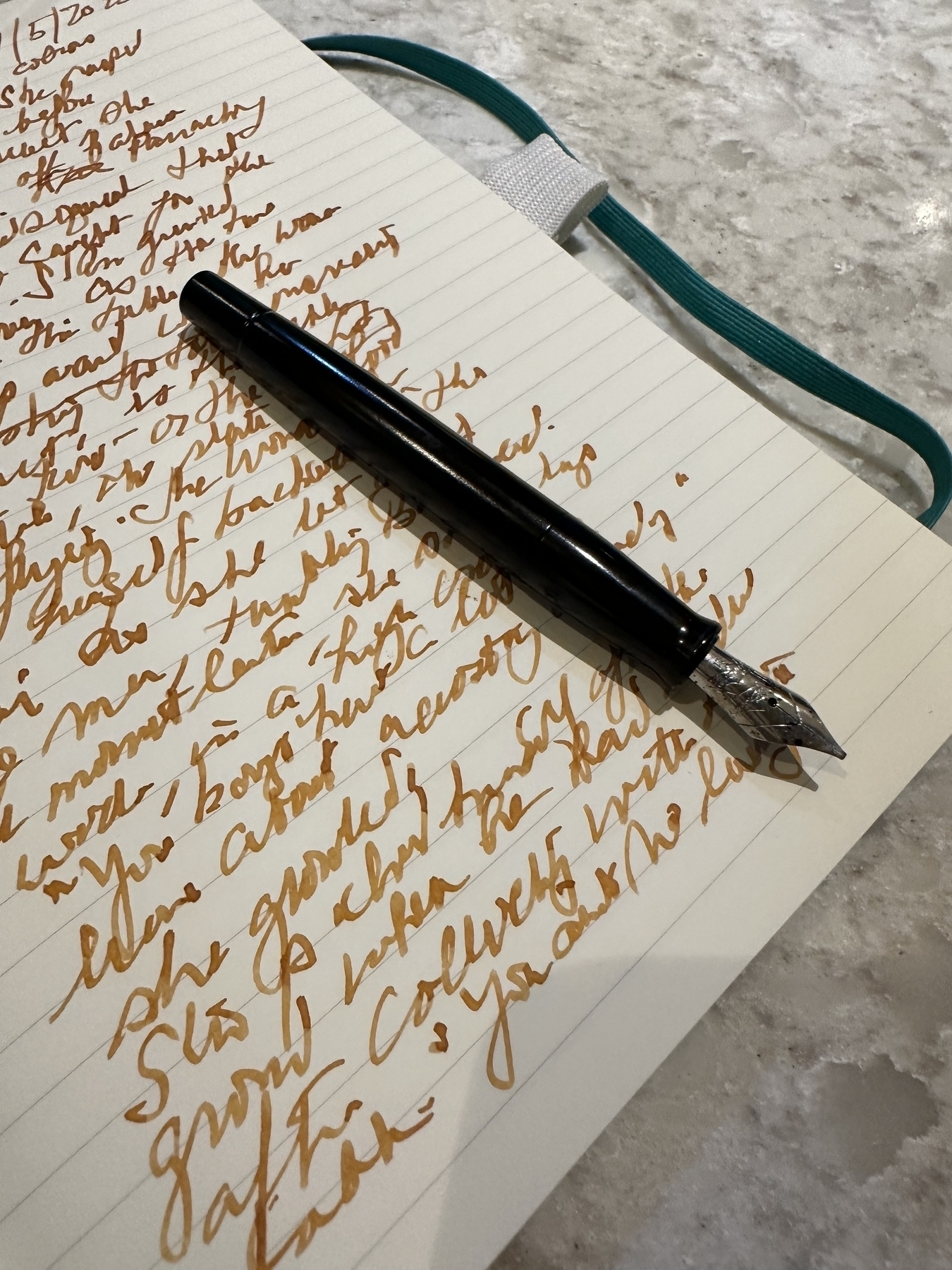Fountain pen and a page of writing 