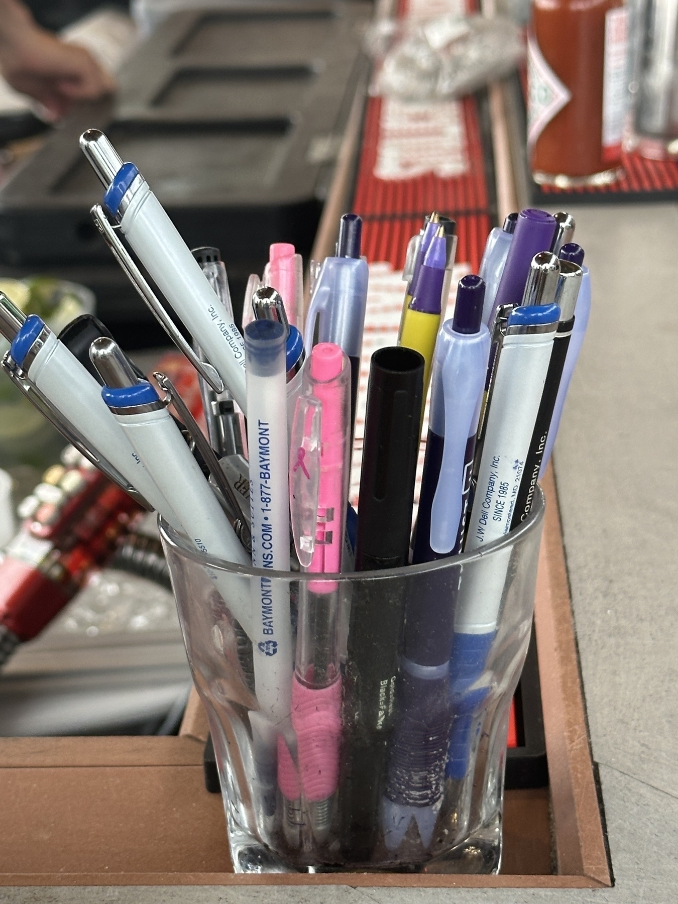 Pens at a restaurant bar. 