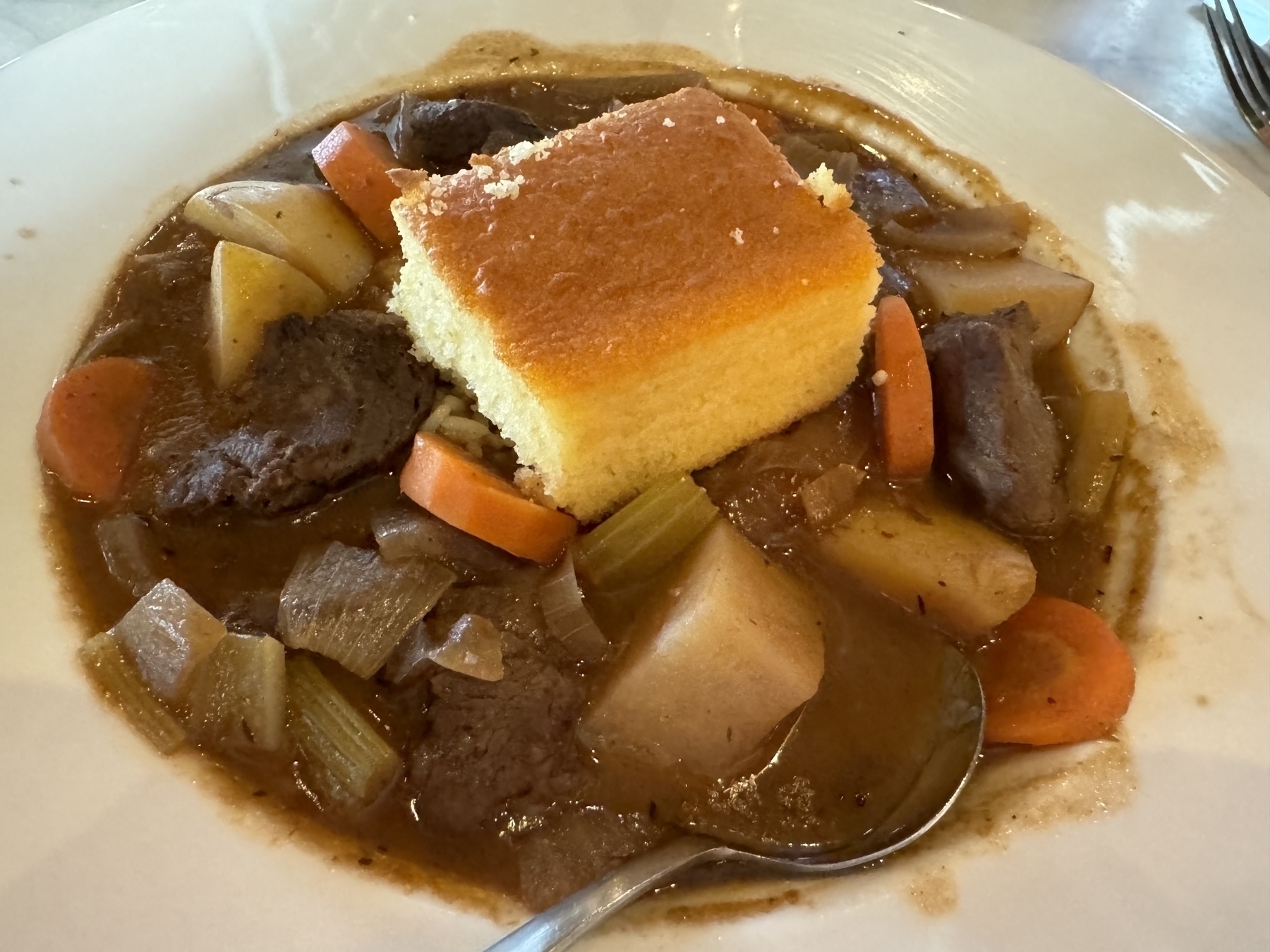 Beef stew over rice 
