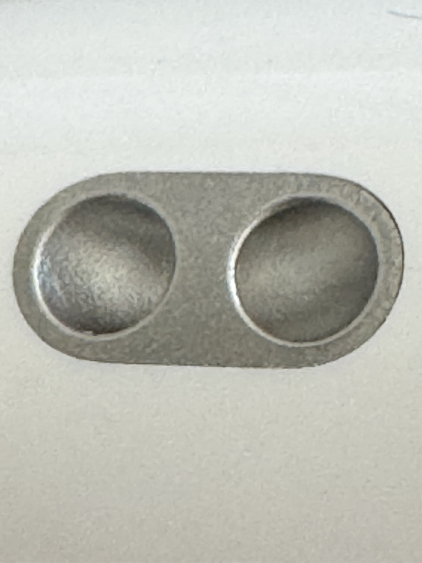 Mystery holes on the side of the AirPod2Pro case.