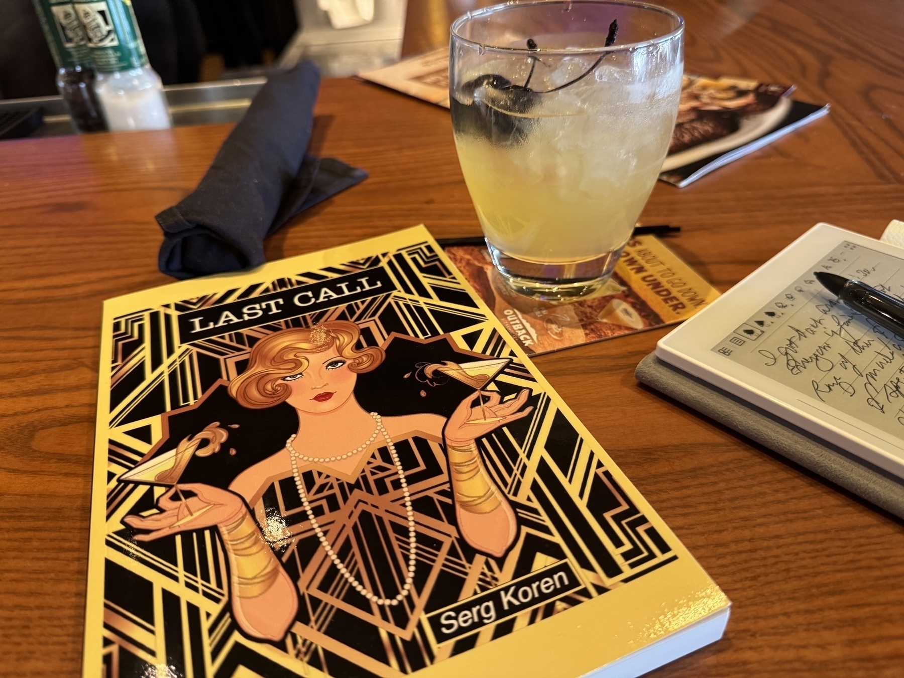 My book, Last Call, fancy juice. And my SuperNote. 