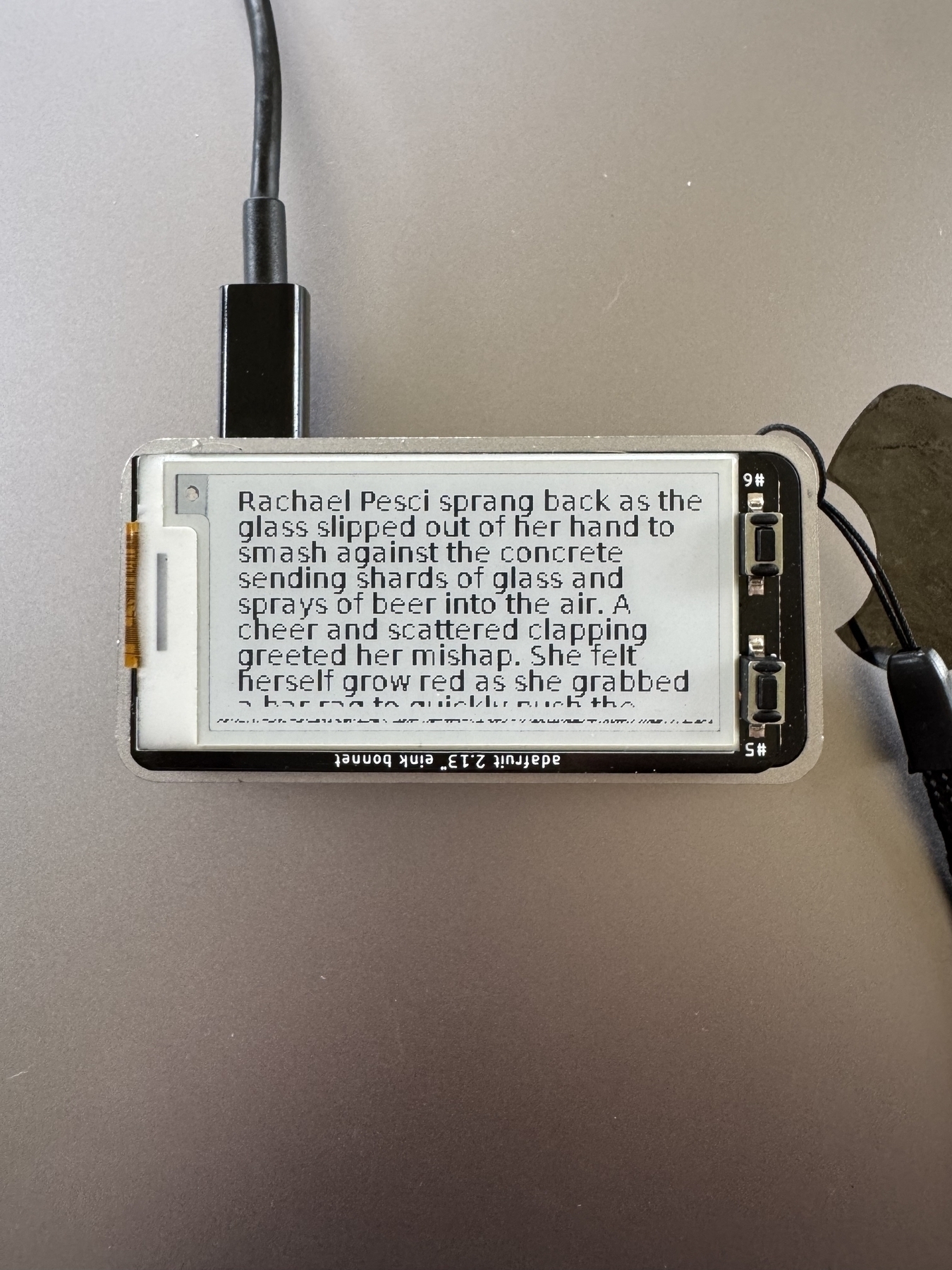 Mini eink display with a page of text 