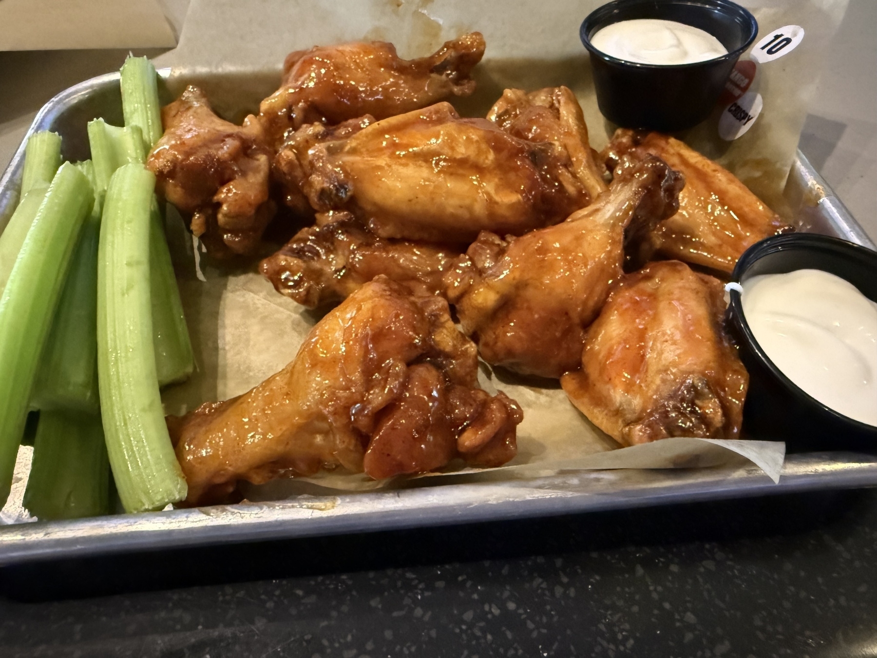 Mango habanero wings and veggies. 
