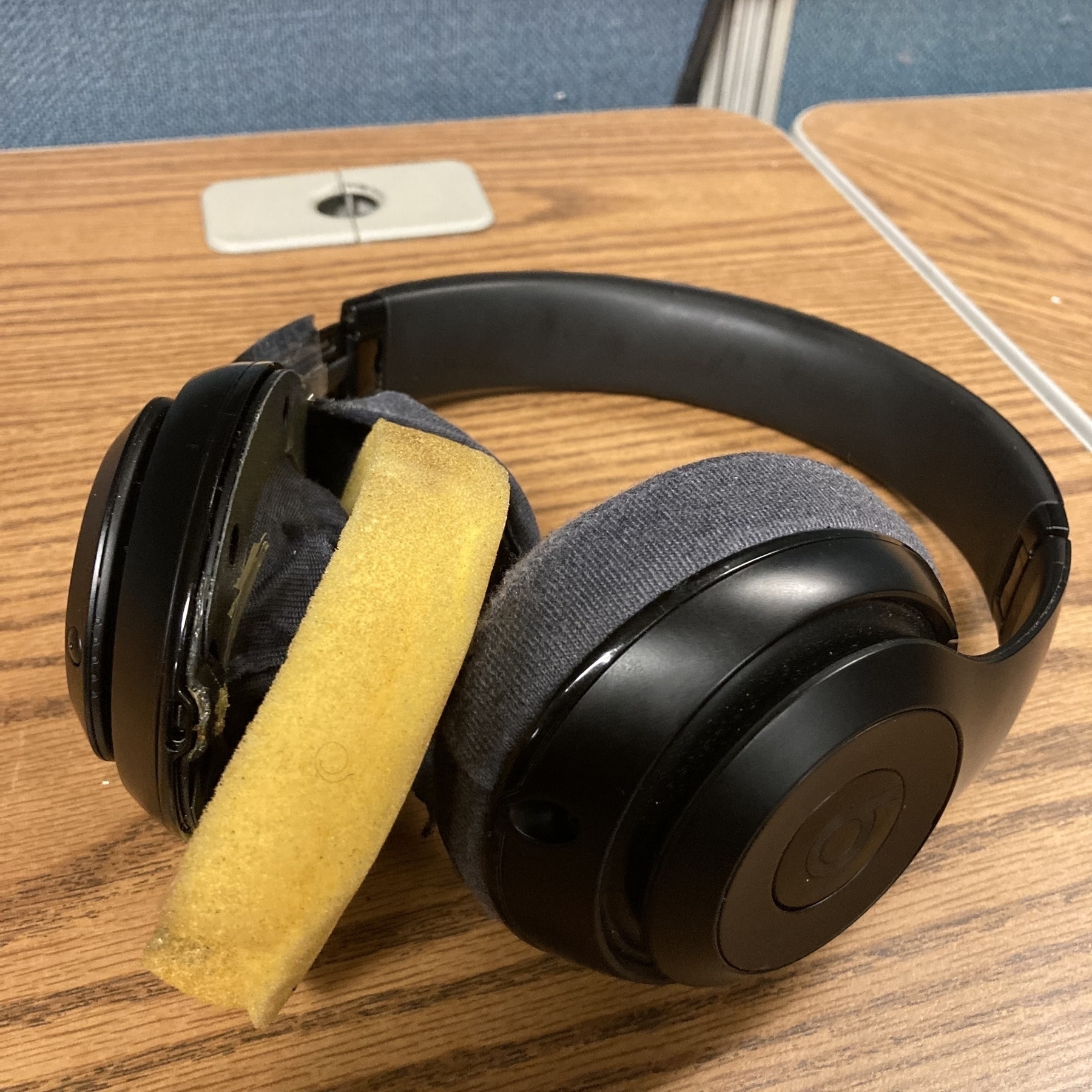 A broken pair of headphones. 